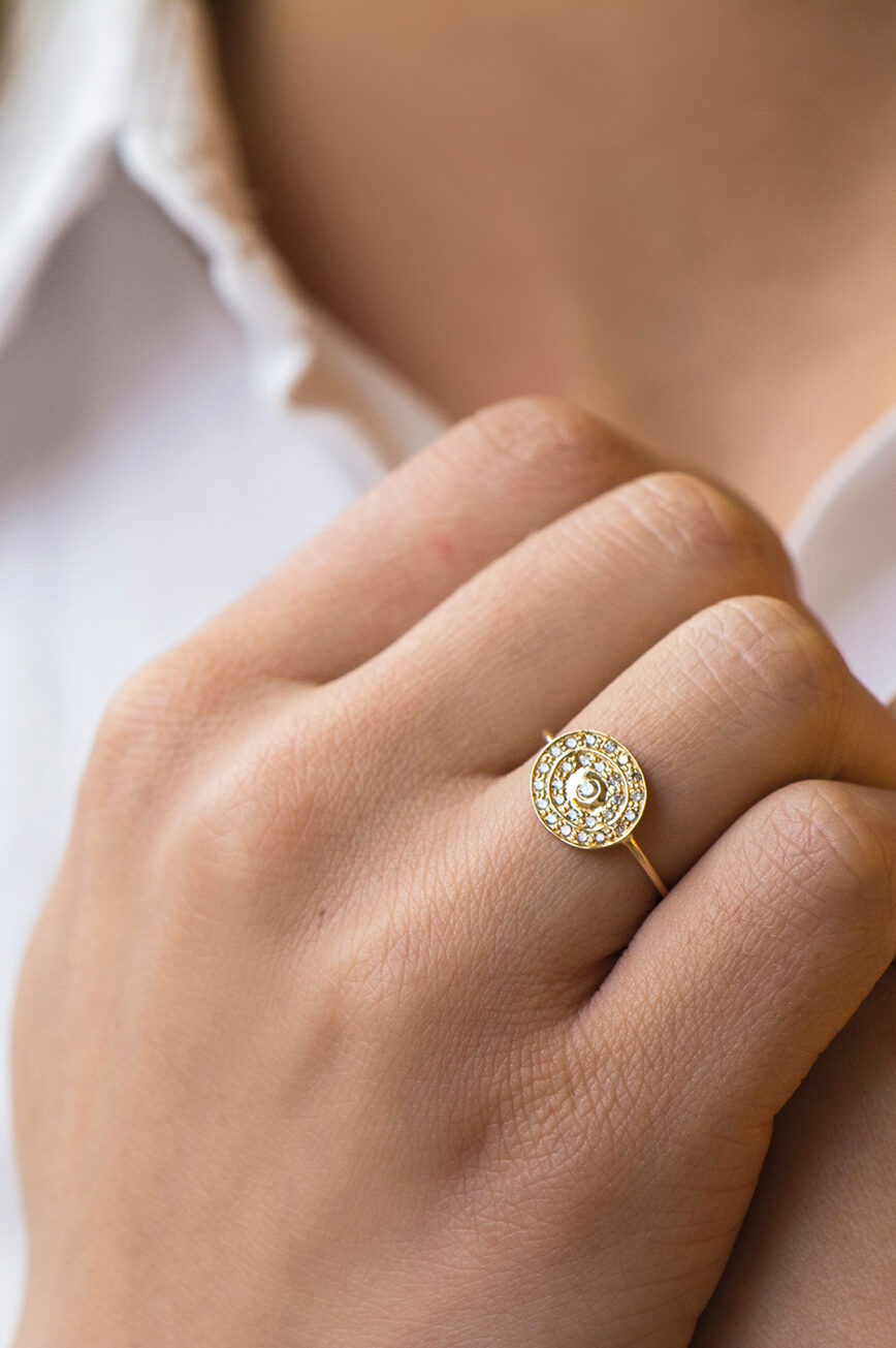 Yellow gold wide ring circular pavé diamond disc eye motif band Celine Daoust