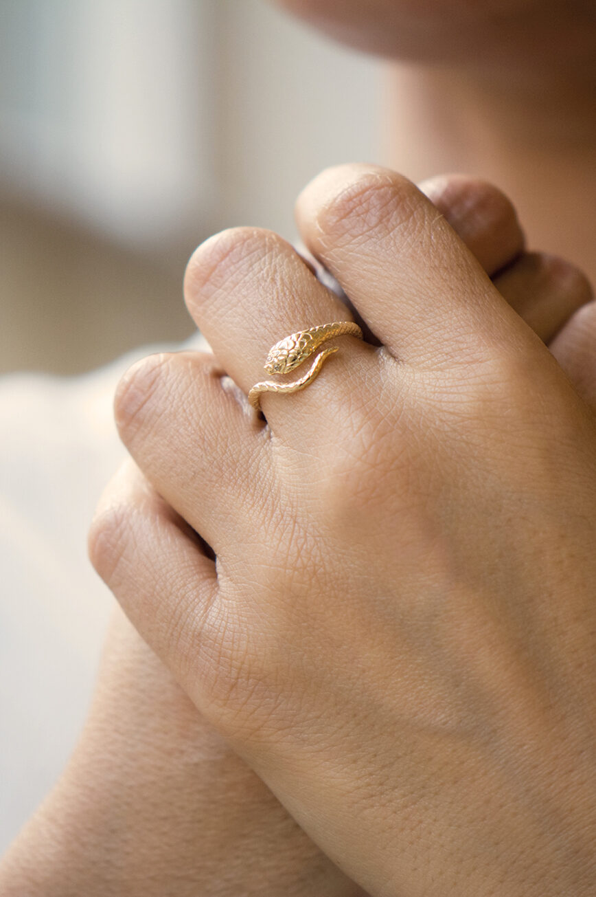 Gold ring sculpted cobra motif engraved band diamond accent Celine Daoust