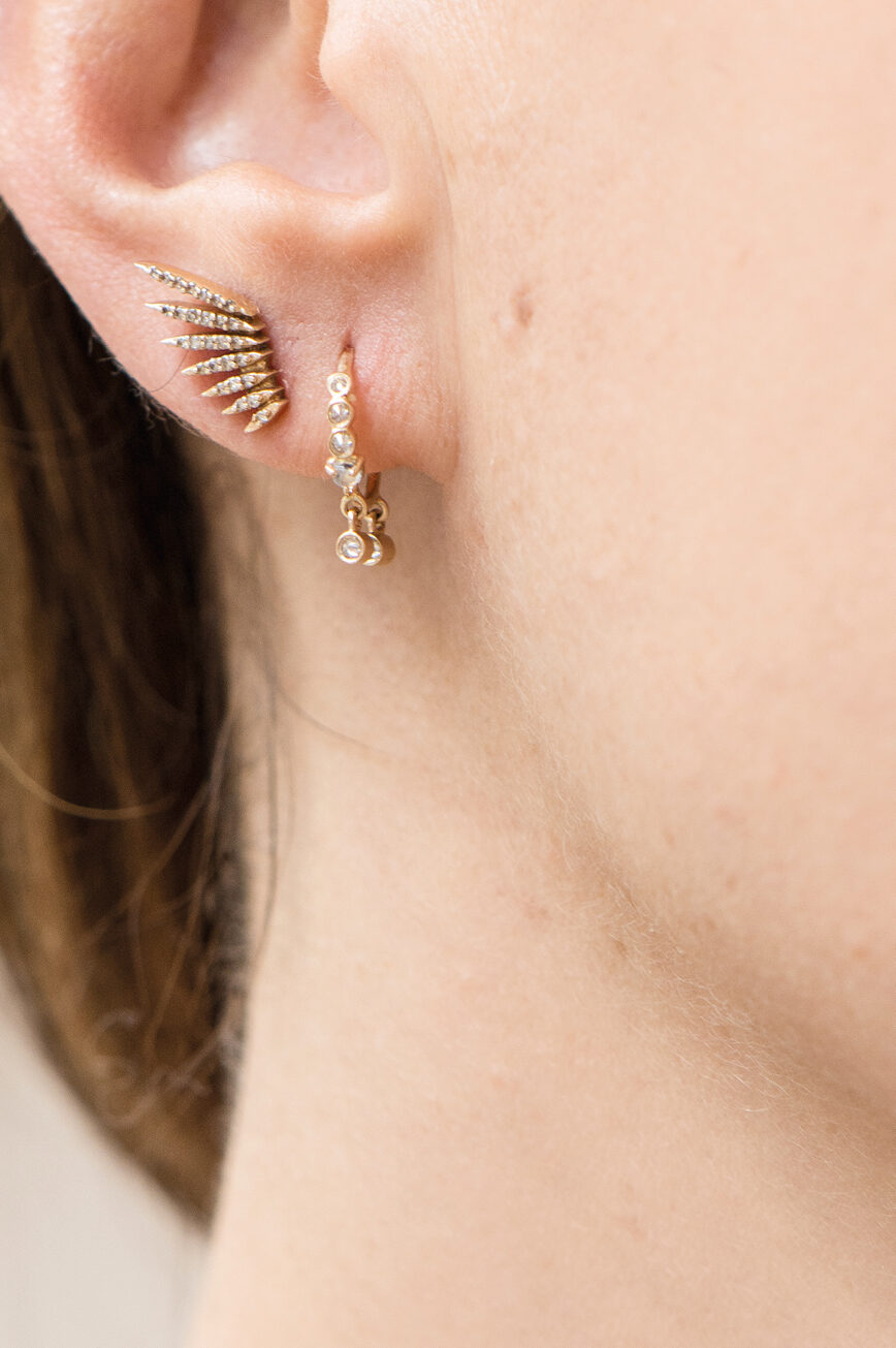 Yellow gold stud earrings sculpted wing motif pavé diamond pair Celine Daoust
