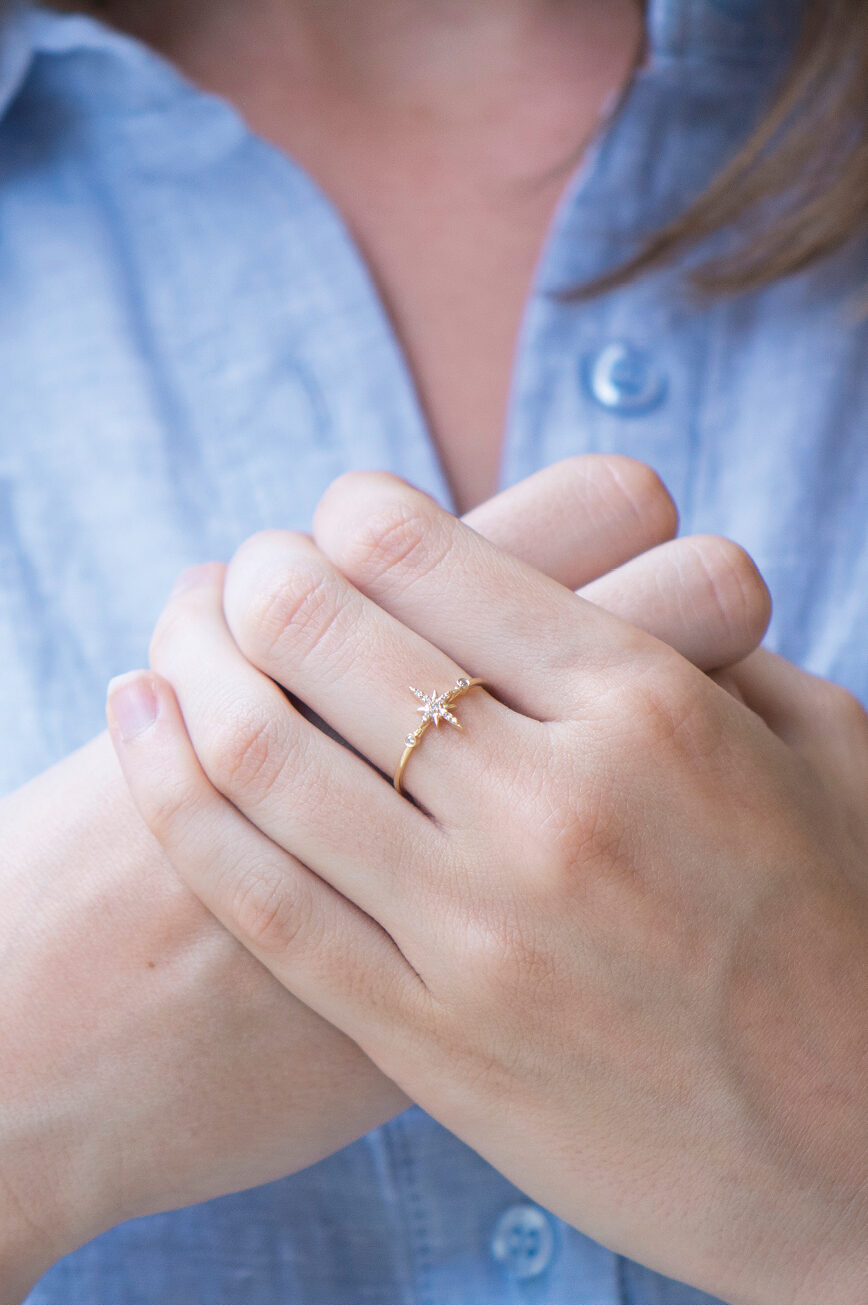 Yellow gold ring north star diamond motif diamond accent slim band Celine Daoust
