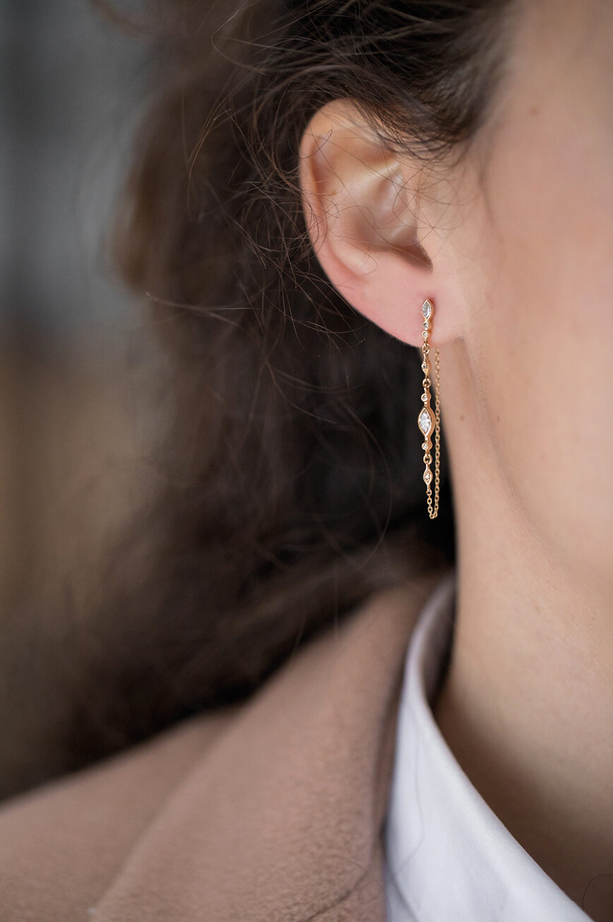 Yellow gold single long chain earring diamond eye motif chain drop Celine Daoust