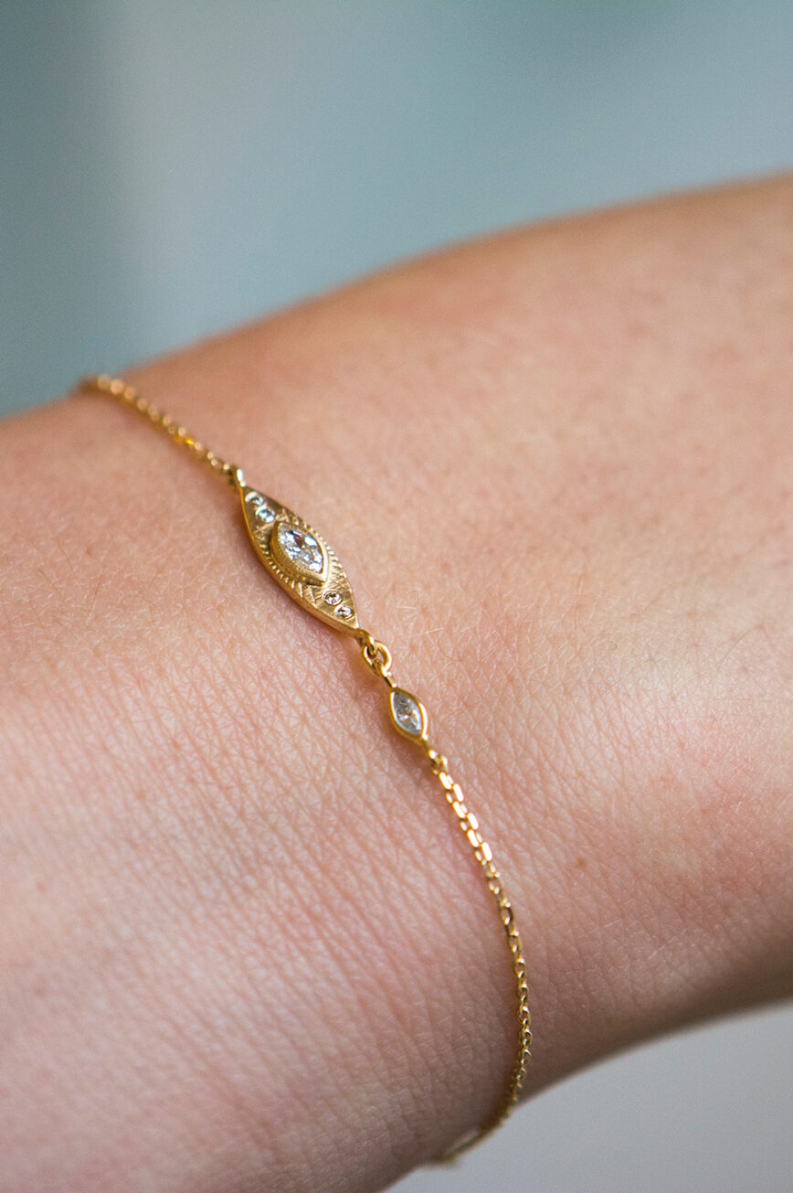 Yellow gold chain bracelet marquise sun eye diamond station Celine Daoust