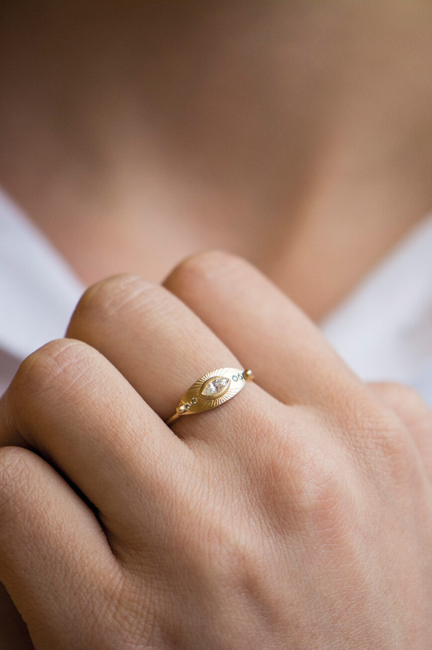 Gold ring large eye motif marquise diamond engraved sun rays Celine Daoust