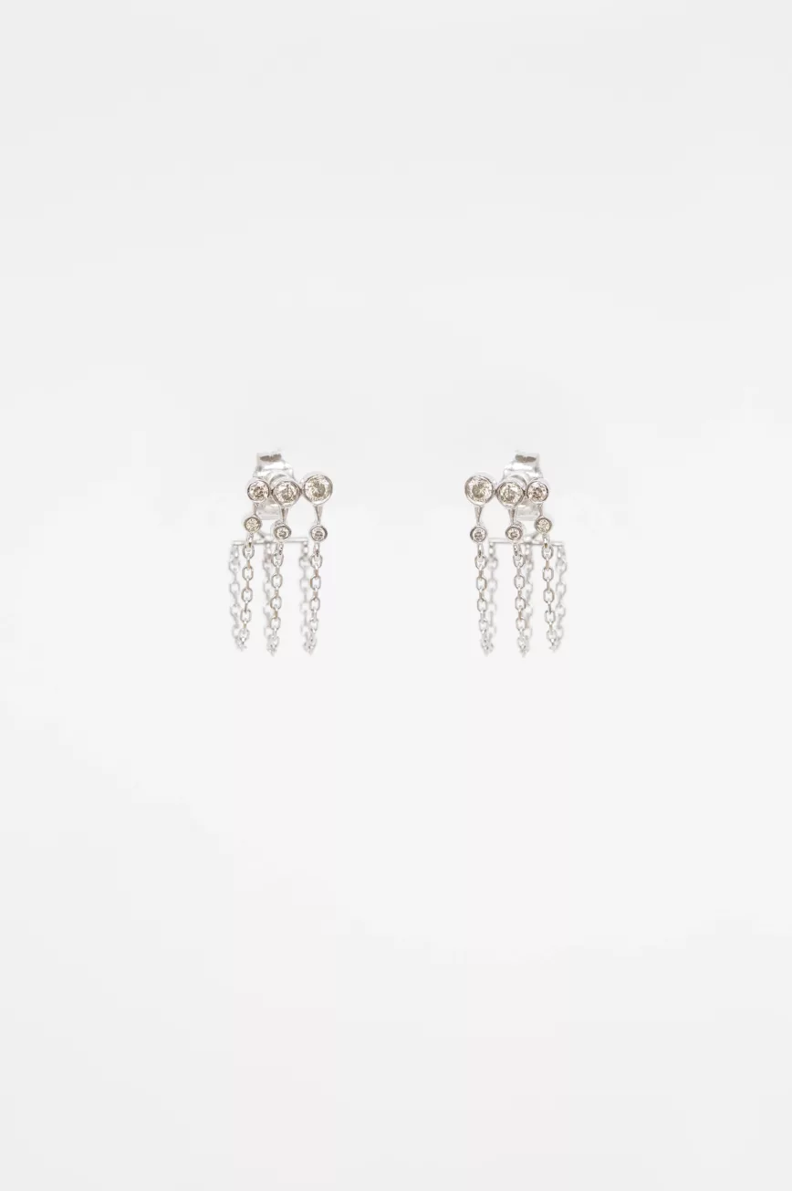 white gold chain earrings with three diamond constellation clusters set along a delicate chain, worn as an ear crawler