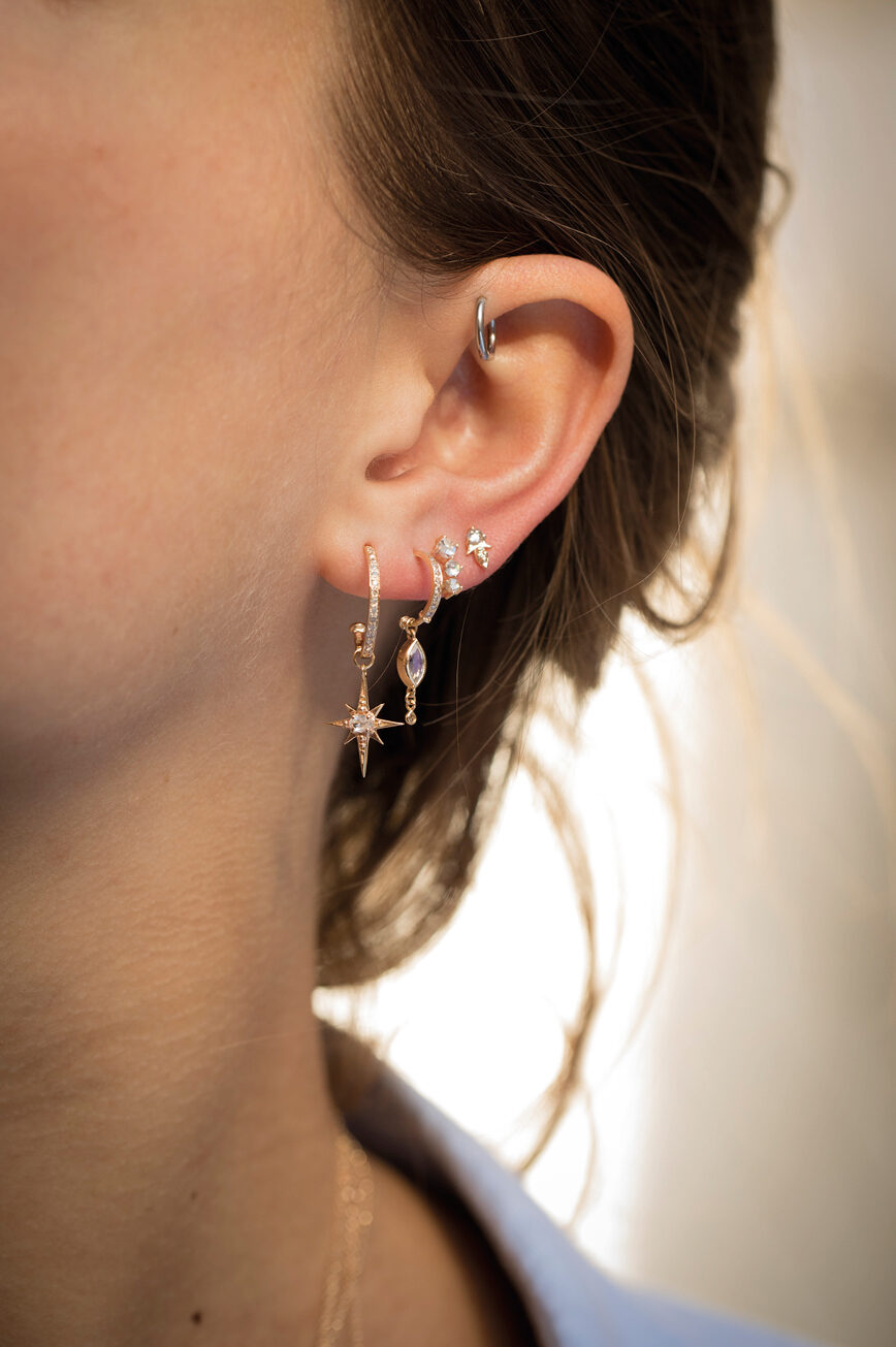 Yellow gold single hoop earring marquise moonstone diamond drop worn on ear Celine Daoust