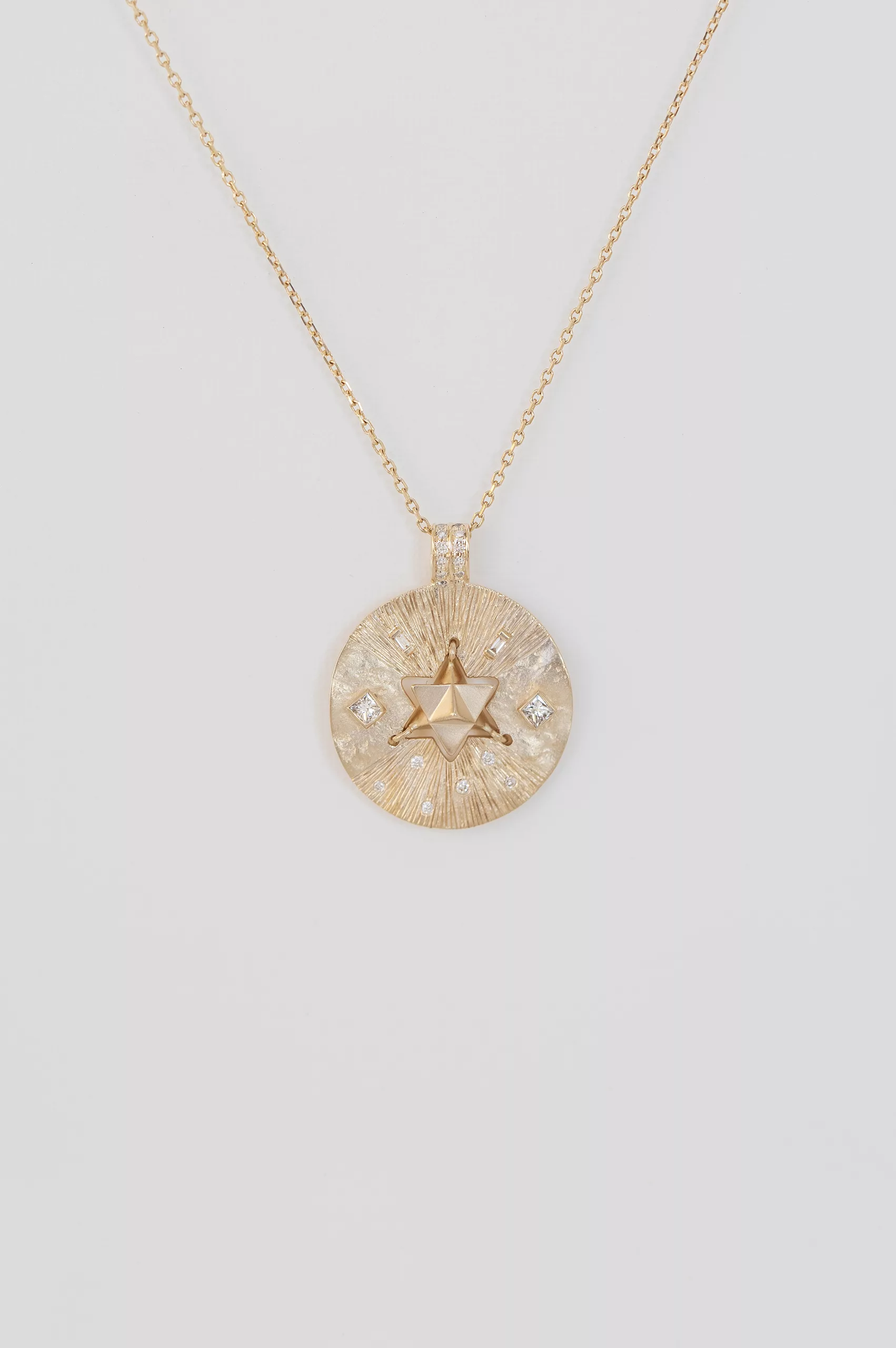 Yellow gold necklace round medal pendant diamond star merkabah motif chain Celine Daoust