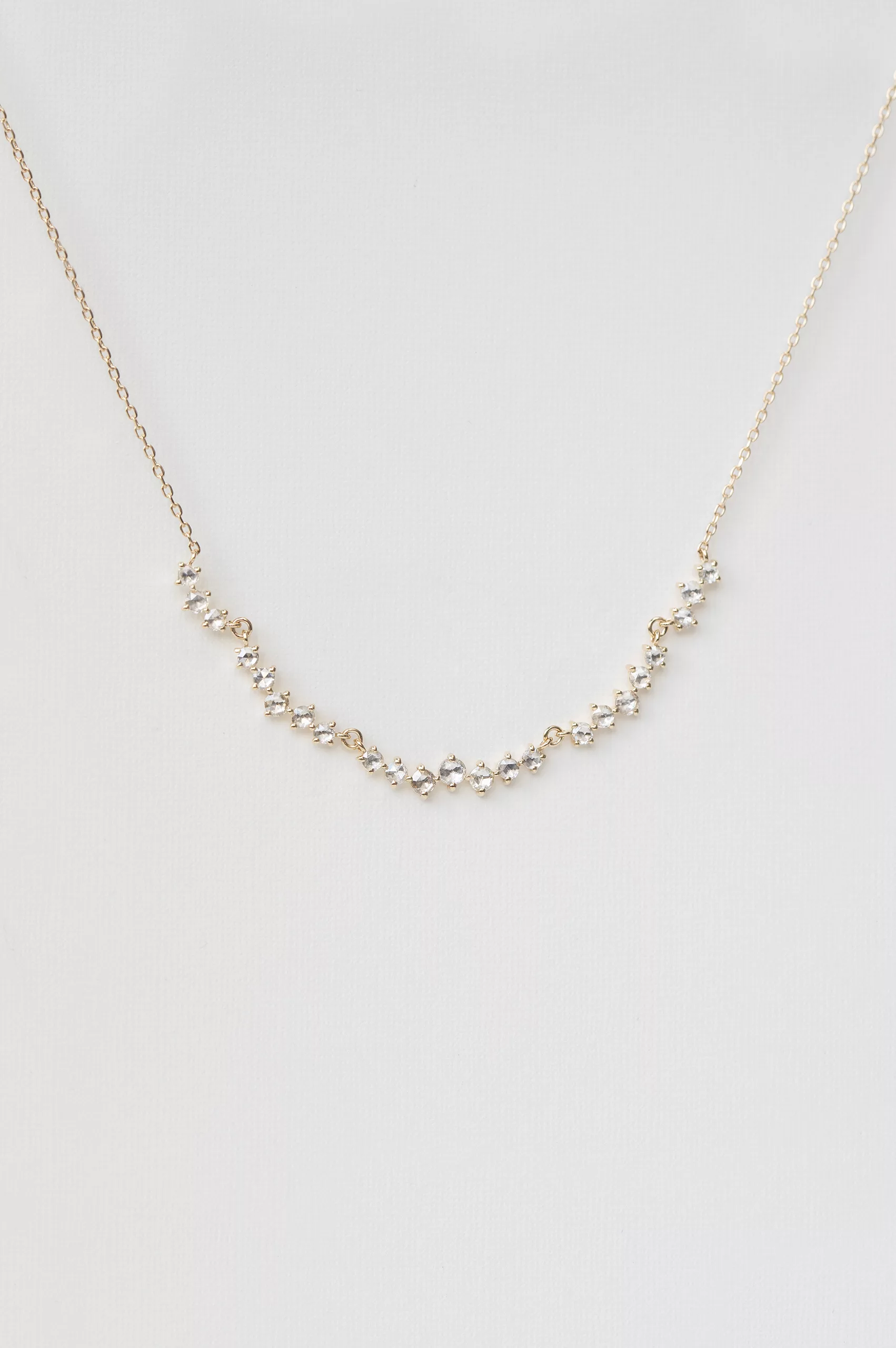 Yellow gold necklace multiple rosecut diamonds twisted curved chain Celine Daoust