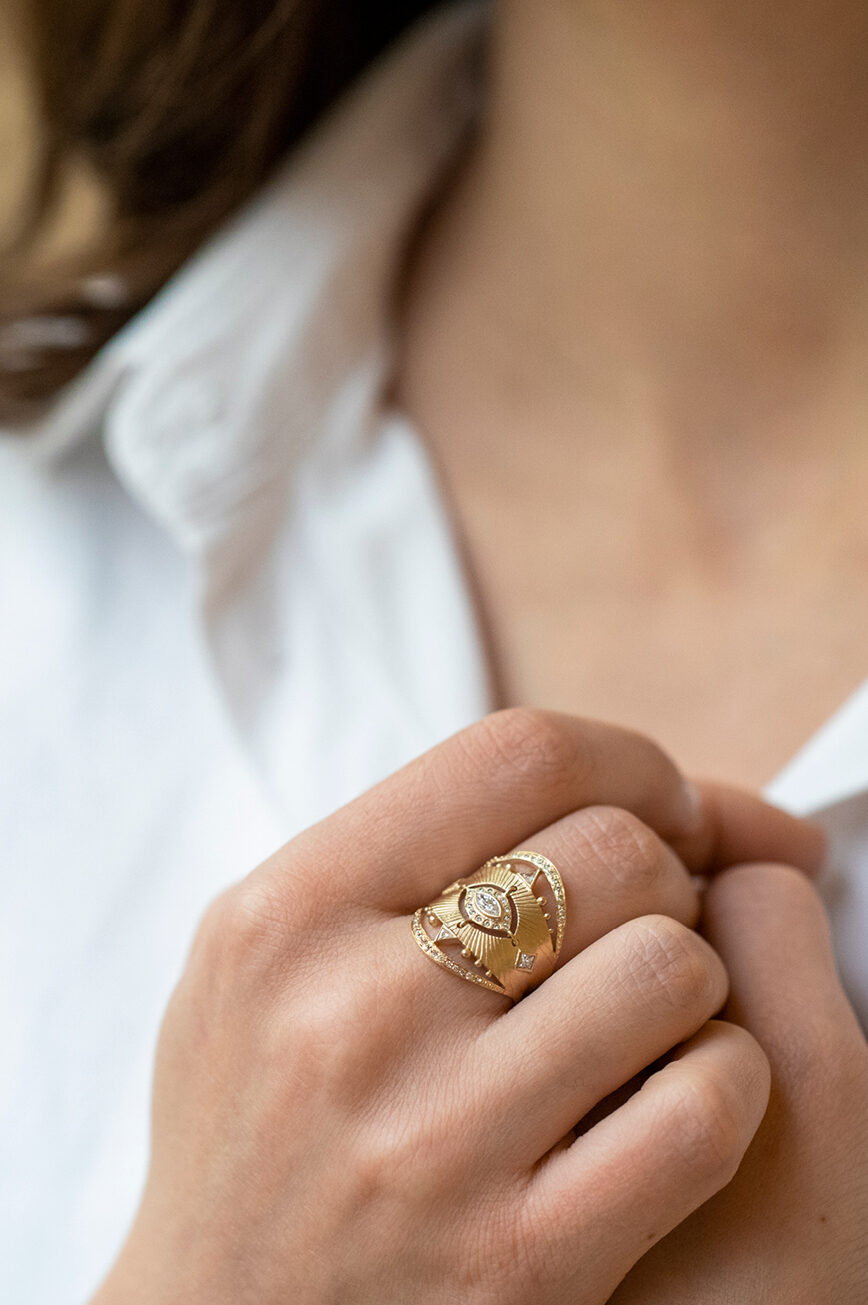 Yellow gold wide ring marquise diamond sun ray open eye pavé diamond frame Celine Daoust