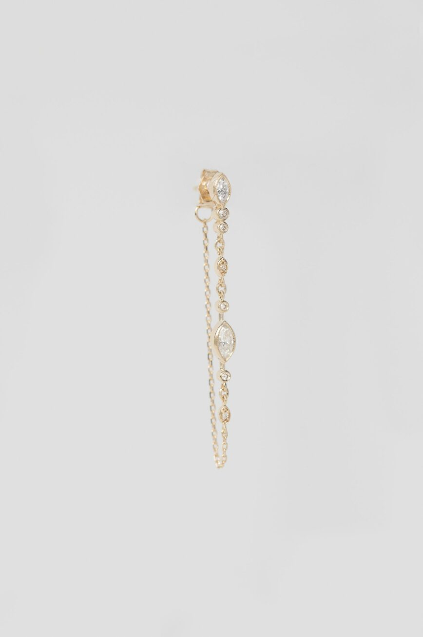 Yellow gold single long chain earring diamond eye motif chain drop Celine Daoust