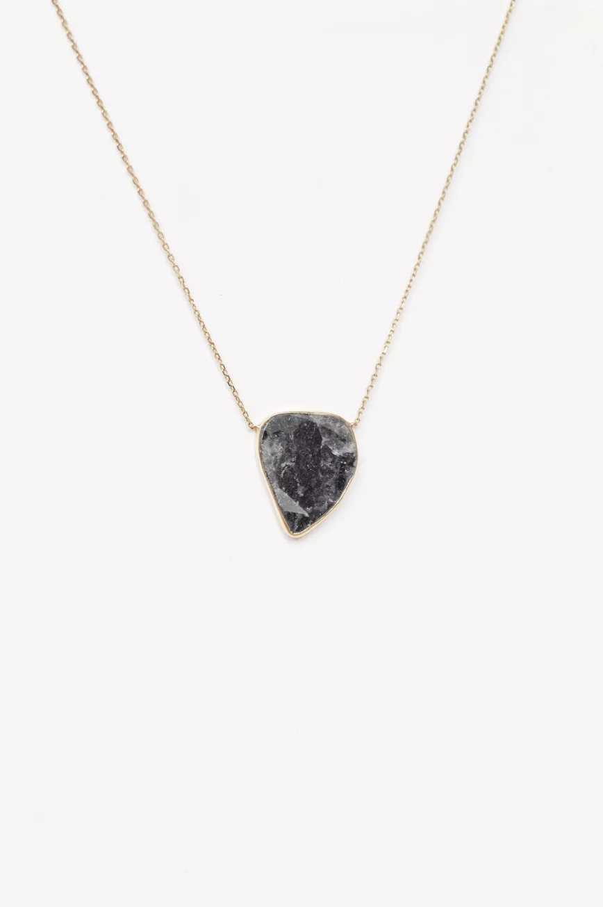 Yellow gold necklace freeform grey diamond slice bezel pendant worn on neck Celine Daoust