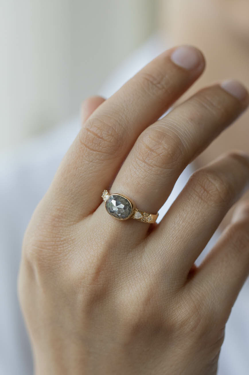 Yellow gold wide band ring oval grey diamond triangle diamond side accents Celine Daoust
