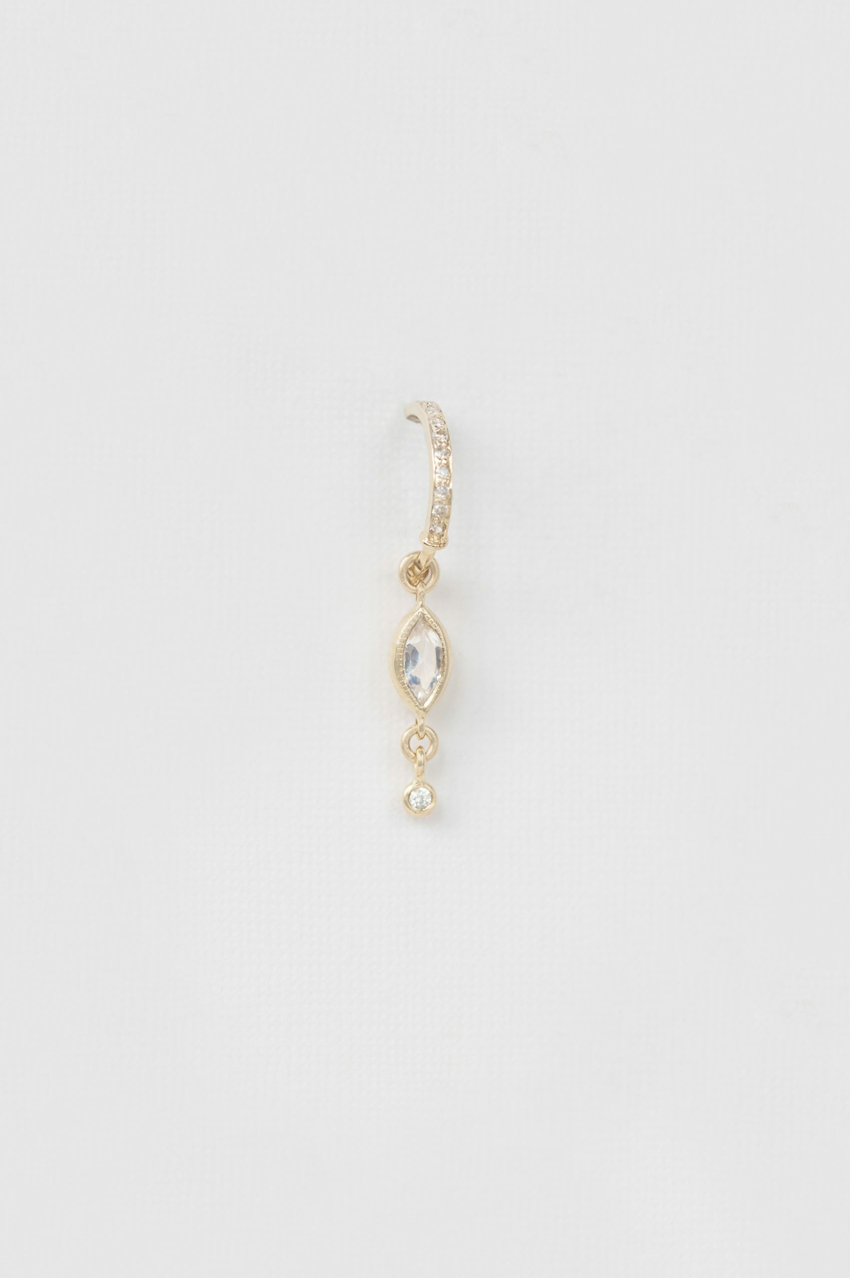 Yellow gold single hoop earring marquise moonstone diamond drop worn on ear Celine Daoust