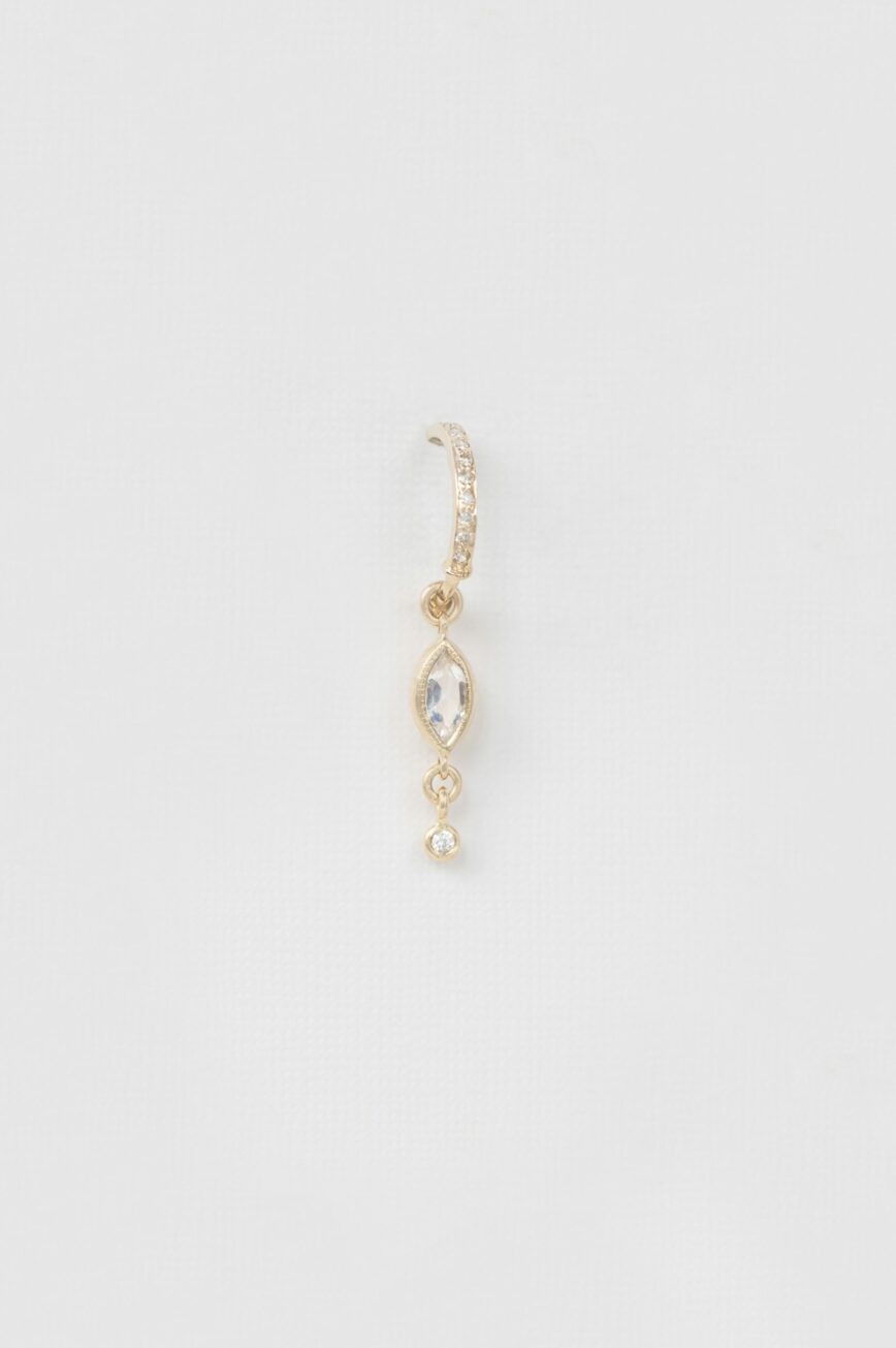 Yellow gold single hoop earring marquise moonstone diamond drop worn on ear Celine Daoust