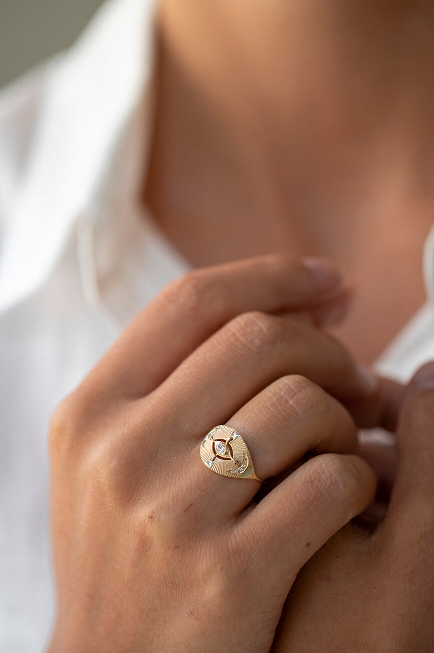Yellow gold signet ring marquise diamond open eye engraved moon motif Celine Daoust