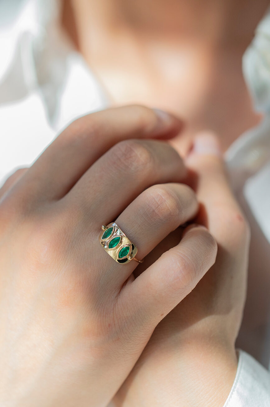 Yellow gold wide band ring three marquise emerald bezel set plate Celine Daoust
