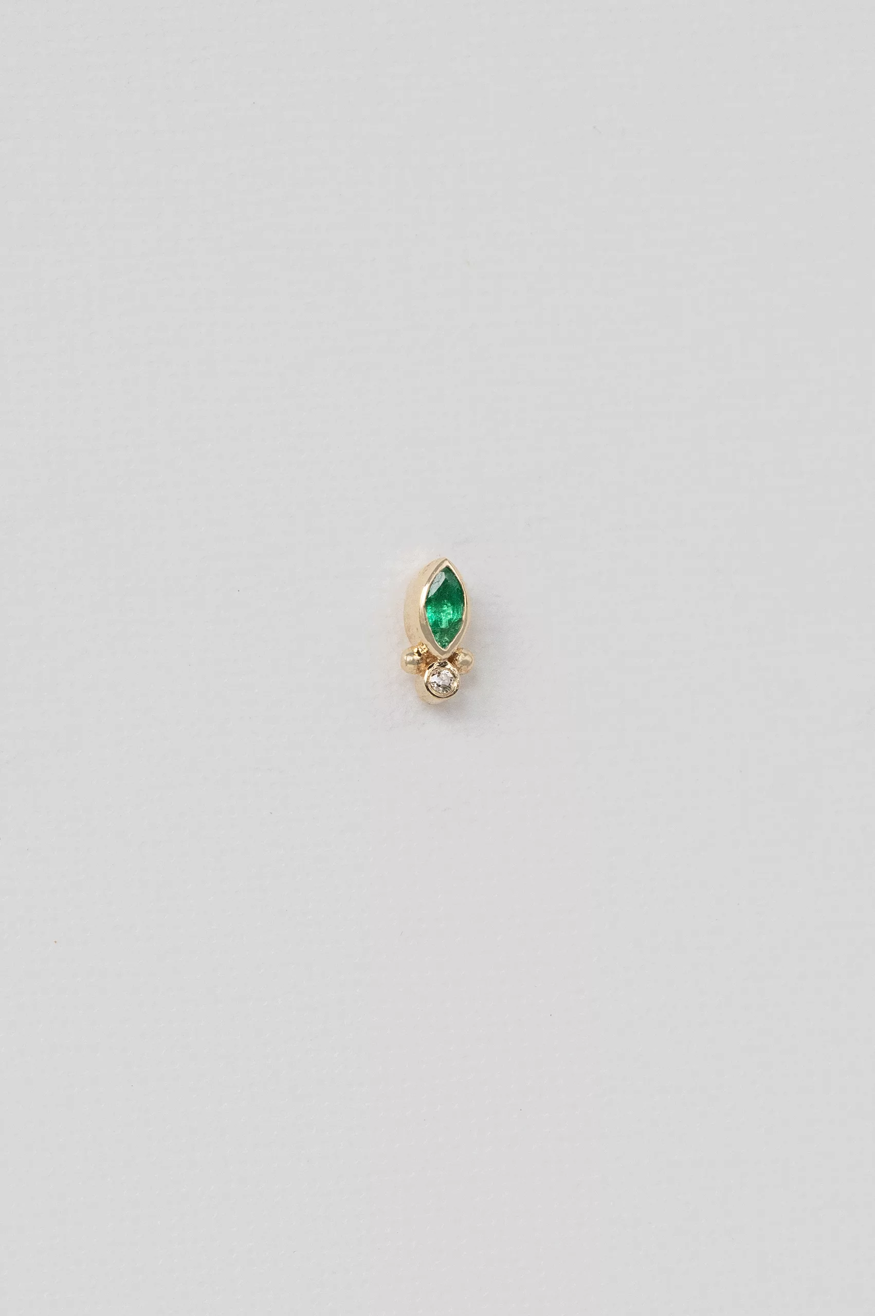 Yellow gold single stud earring marquise emerald diamond accent Celine Daoust