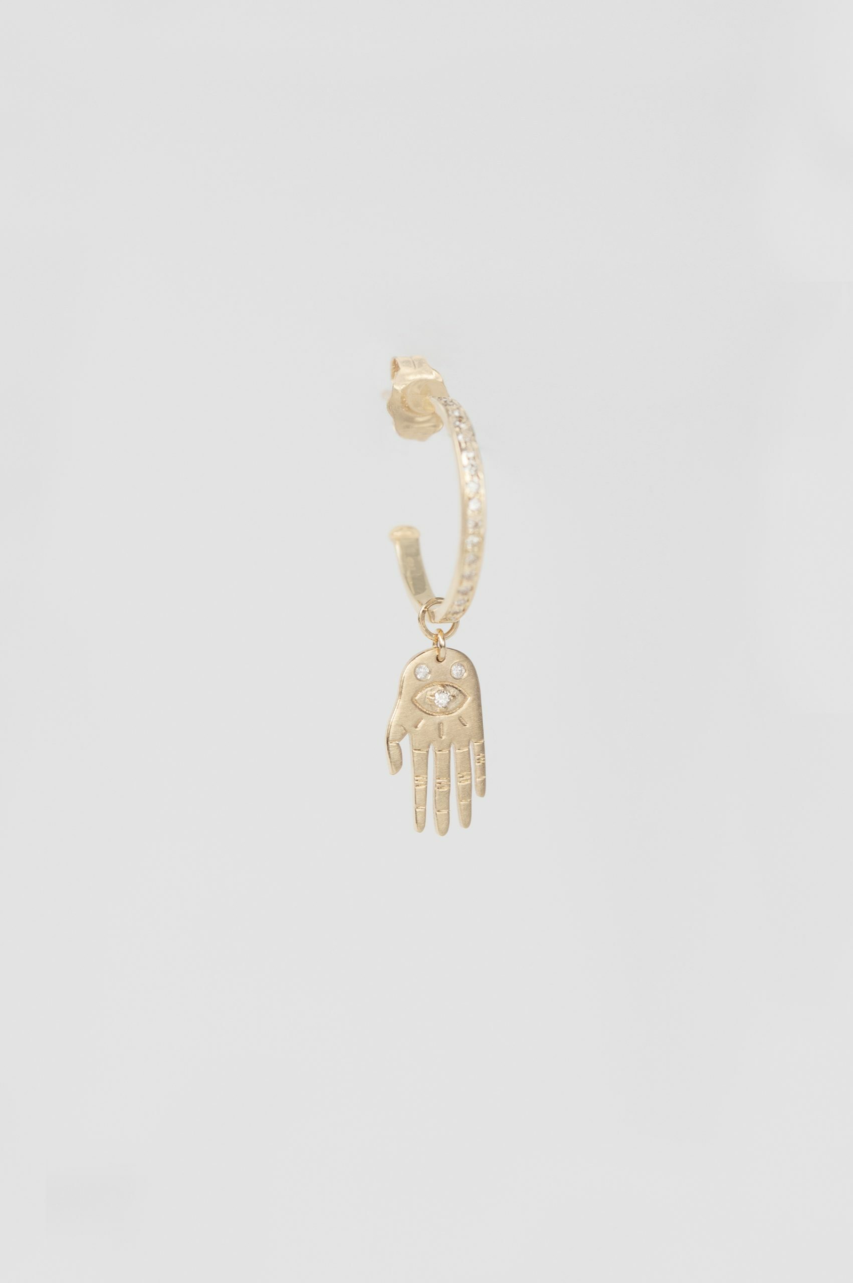 Yellow gold single hoop earring small sculpted hand charm diamond accent drop Celine Daoust