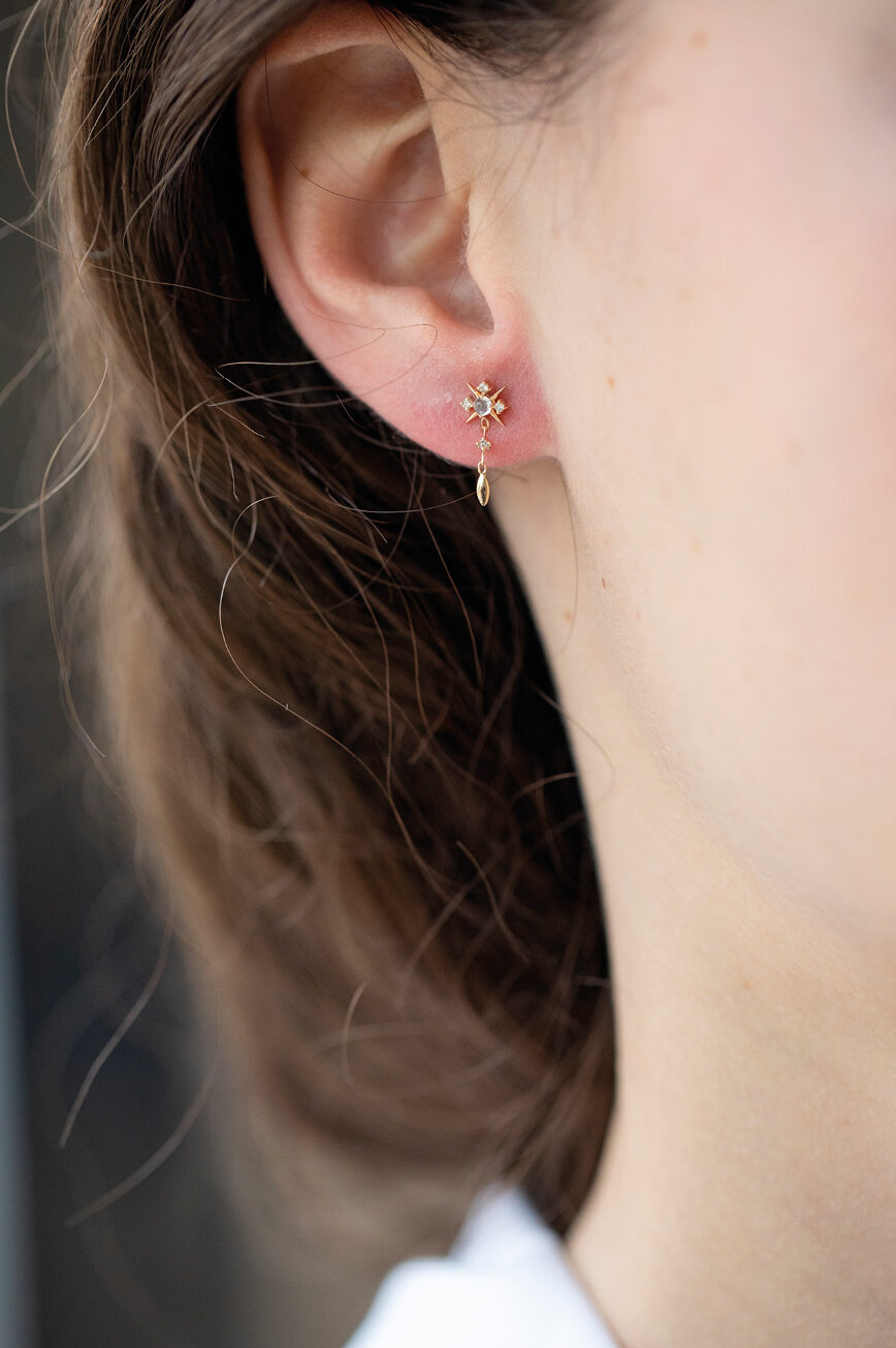 Yellow gold single drop earring starburst diamond motif moonstone gold drop Celine Daoust