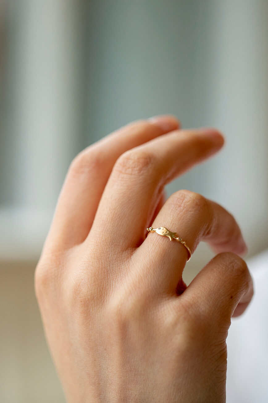 Yellow gold ring sculpted fish motif diamond accent slim band Celine Daoust