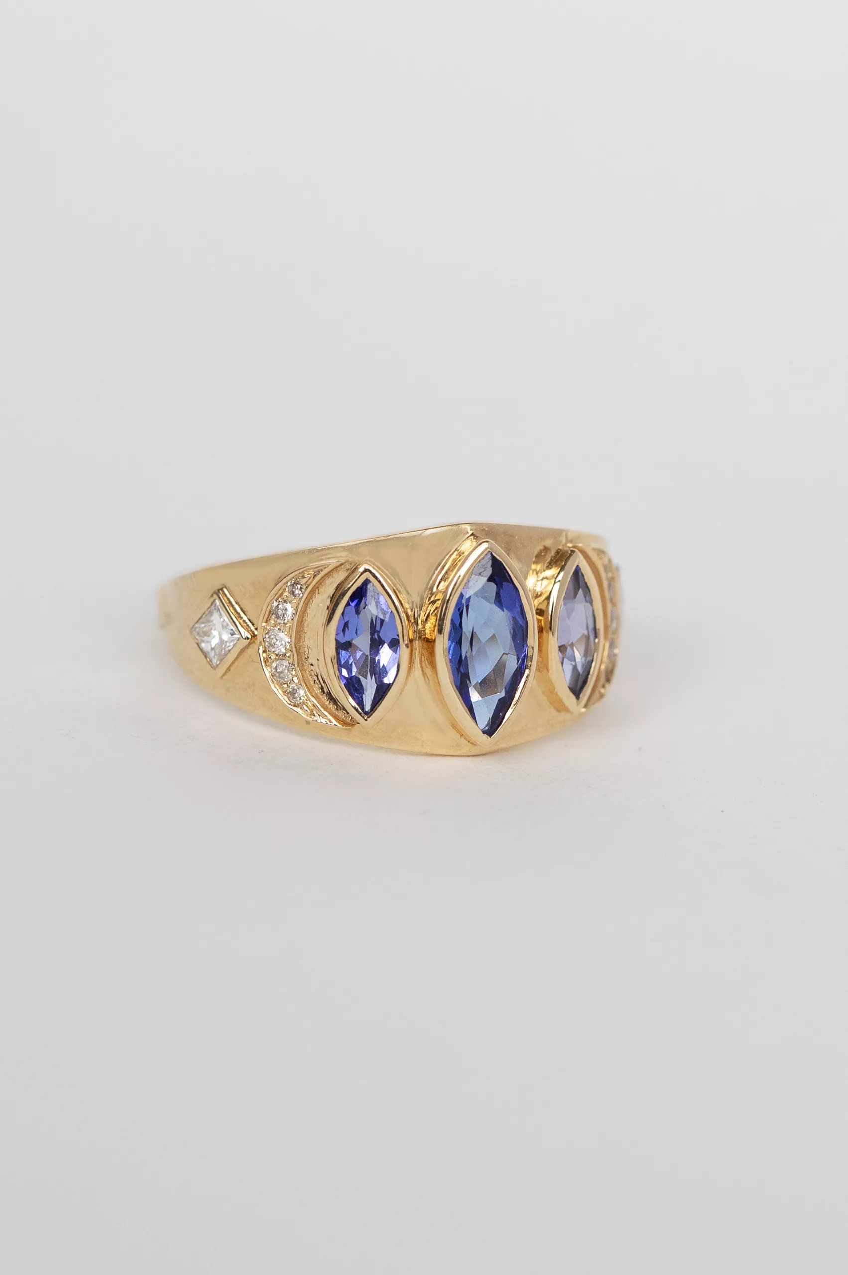 Yellow gold signet ring three marquise tanzanite diamond accent sides Celine Daoust