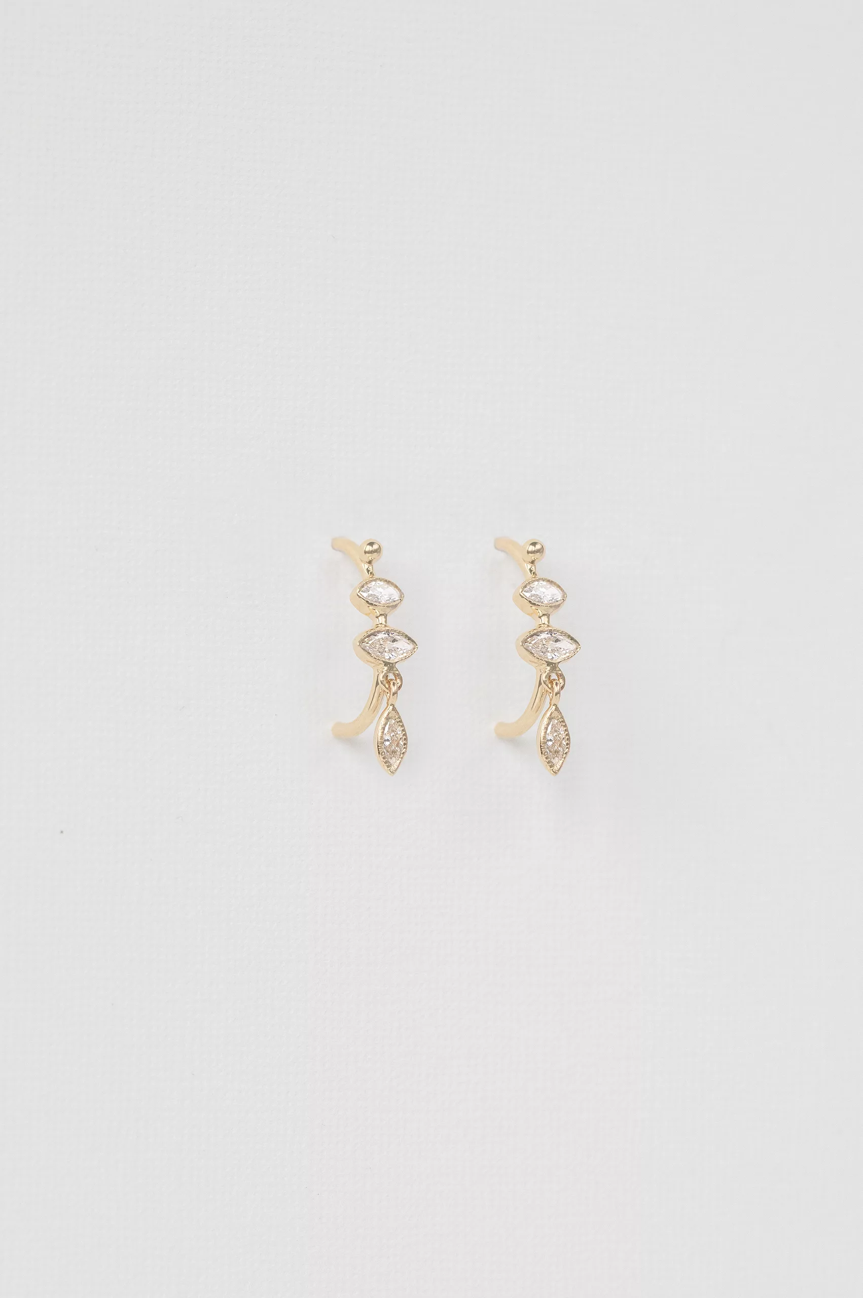 Yellow gold hoop earrings marquise diamond dangling diamond leaf drops pair Celine Daoust