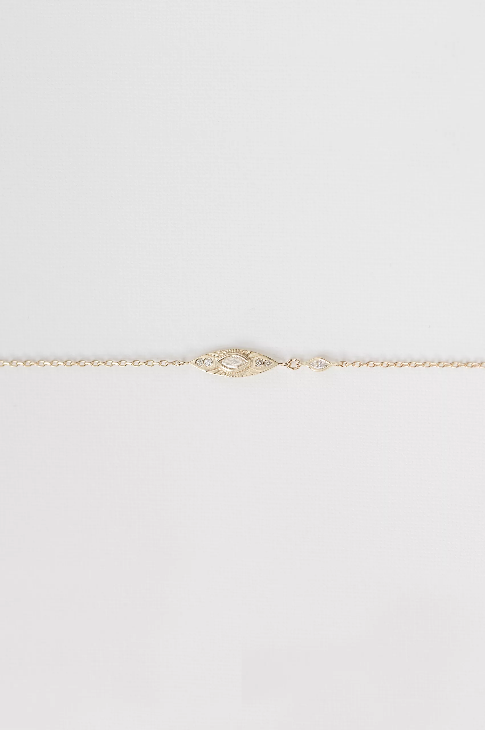 Yellow gold chain bracelet marquise sun eye diamond station Celine Daoust