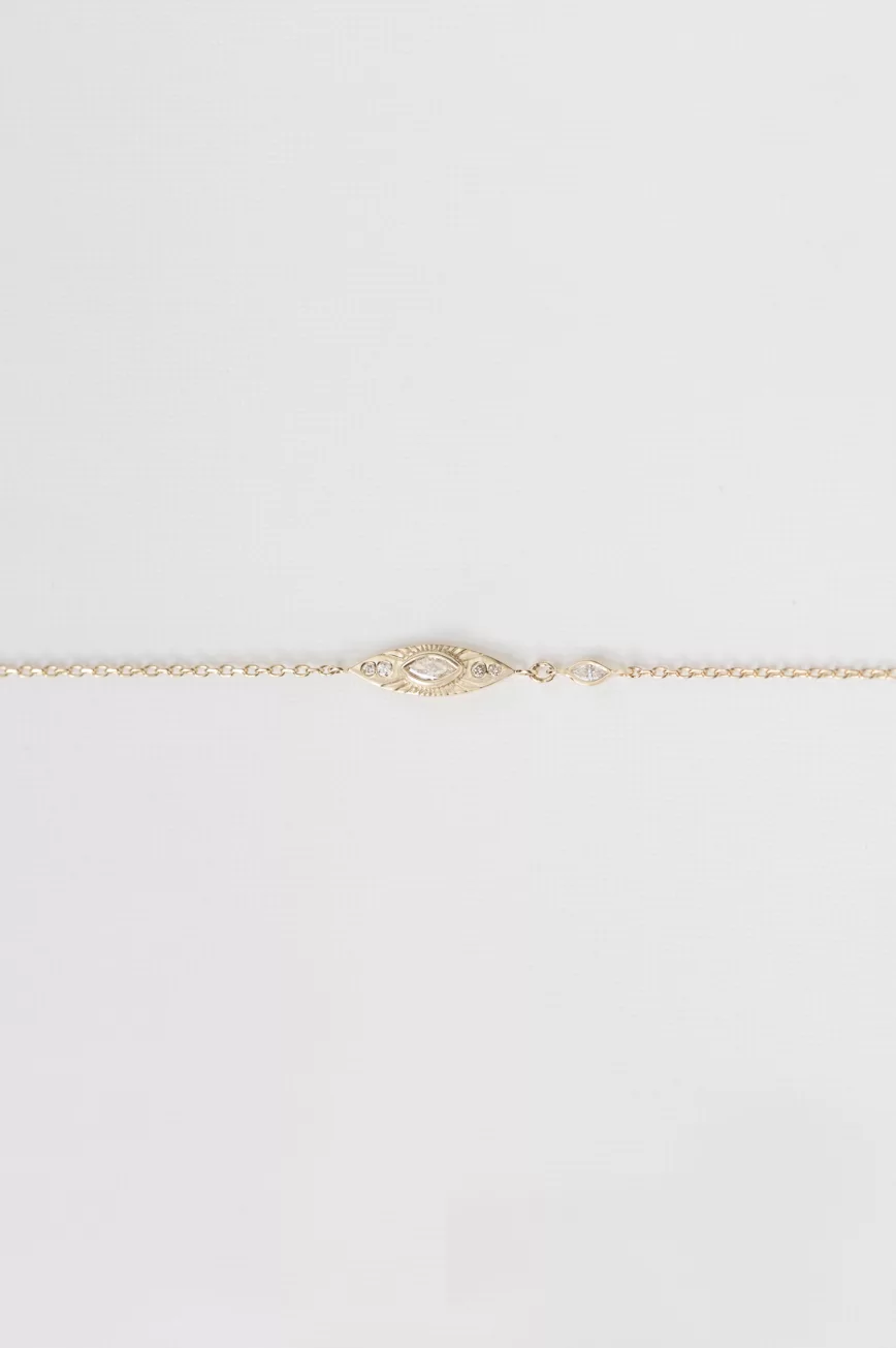 Yellow gold chain bracelet marquise sun eye diamond station Celine Daoust