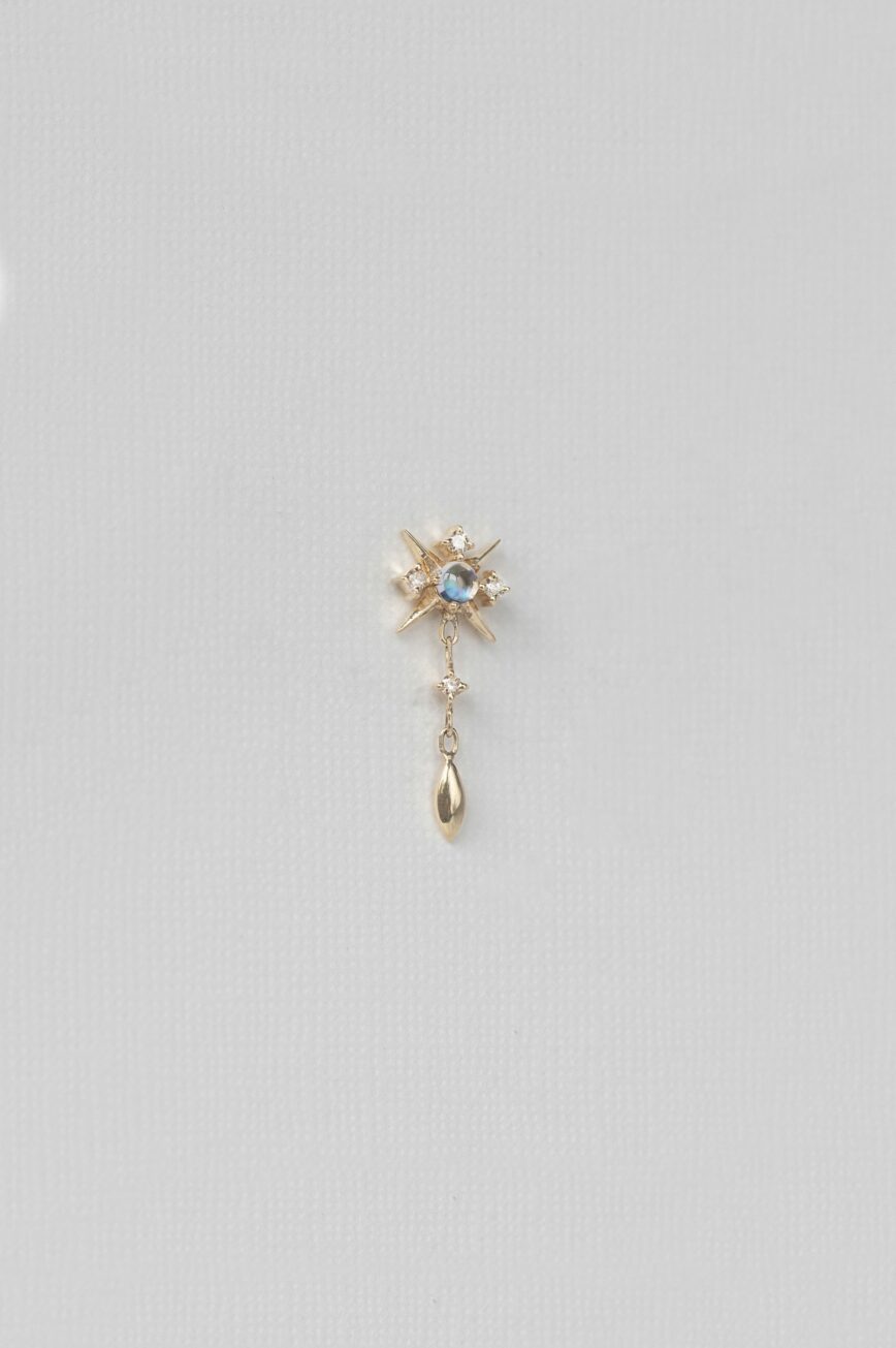 Yellow gold single drop earring starburst diamond motif moonstone gold drop Celine Daoust
