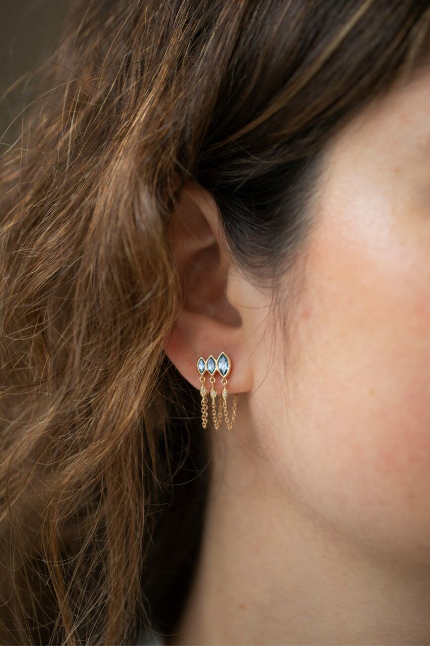 yellow gold drop earrings each with three marquise-cut aquamarines, suspending three fine gold chains with small diamond drops
