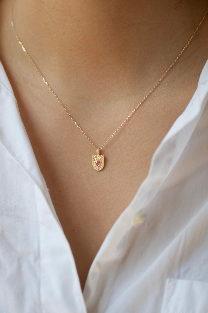 Yellow gold necklace engraved shield pendant pink spinel heart diamond motif Celine Daoust