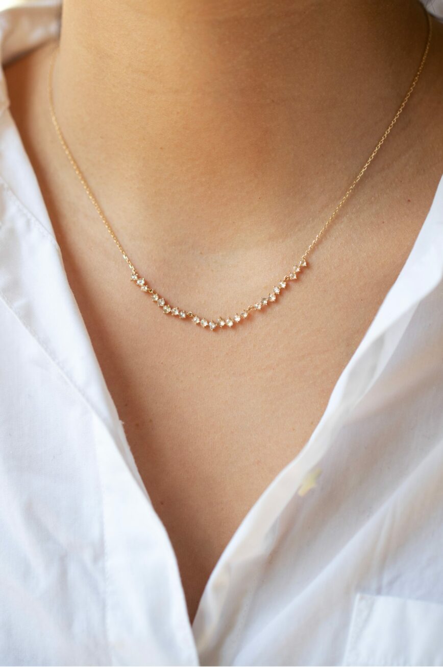 Yellow gold necklace multiple rosecut diamonds twisted curved chain Celine Daoust