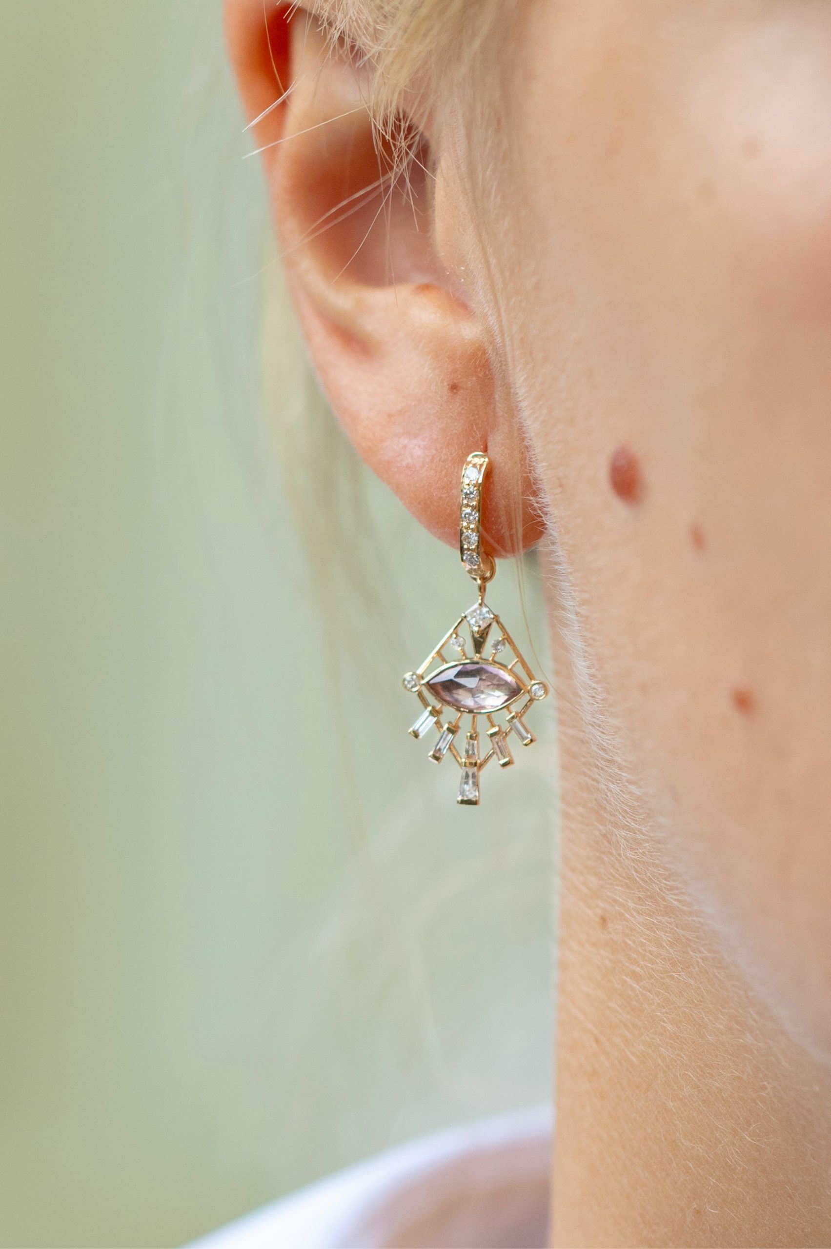 Yellow gold single hoop earring marquise pink tourmaline diamond dream maker worn on ear Celine Daoust
