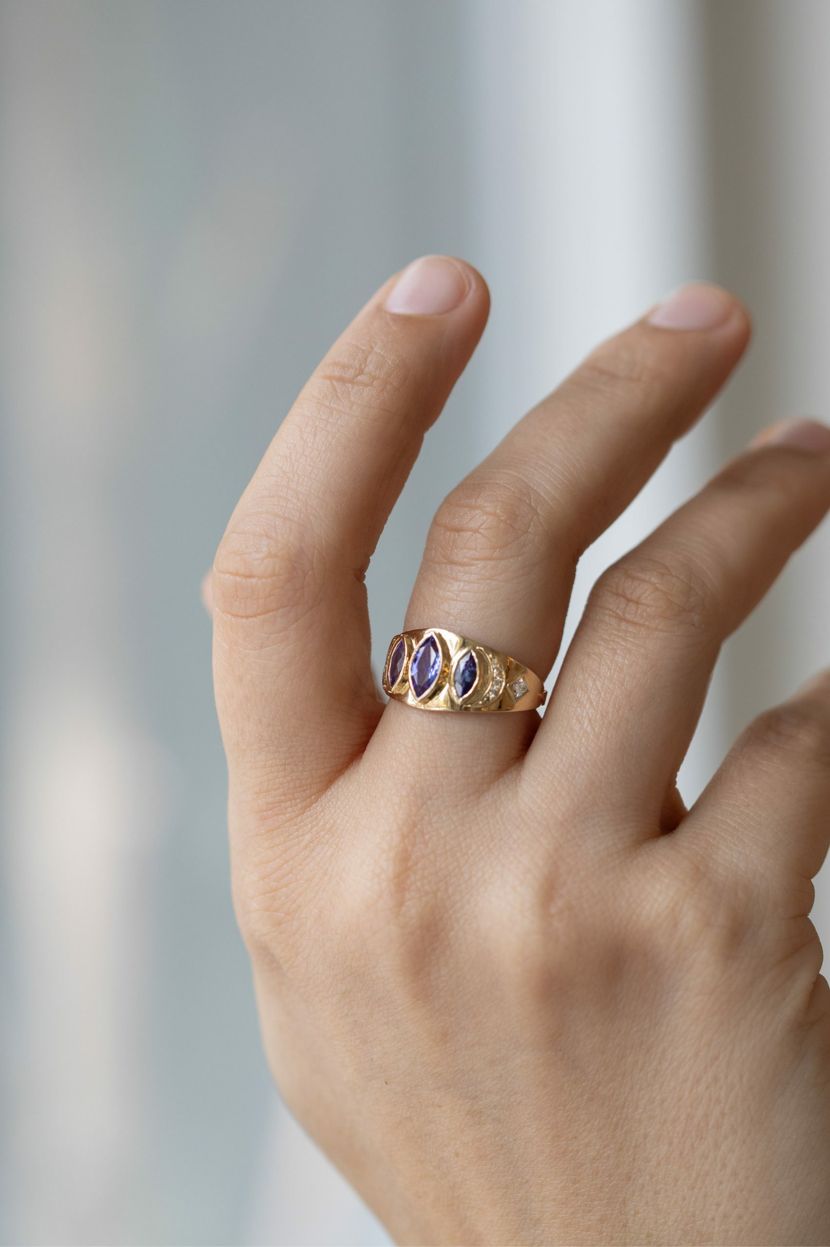 Yellow gold signet ring three marquise tanzanite diamond accent sides Celine Daoust