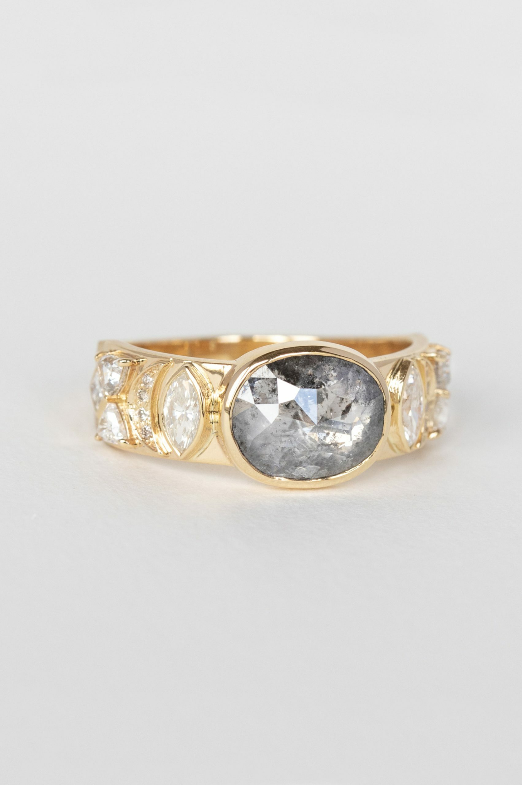 Yellow gold wide band ring oval grey diamond marquise diamond sides Celine Daoust