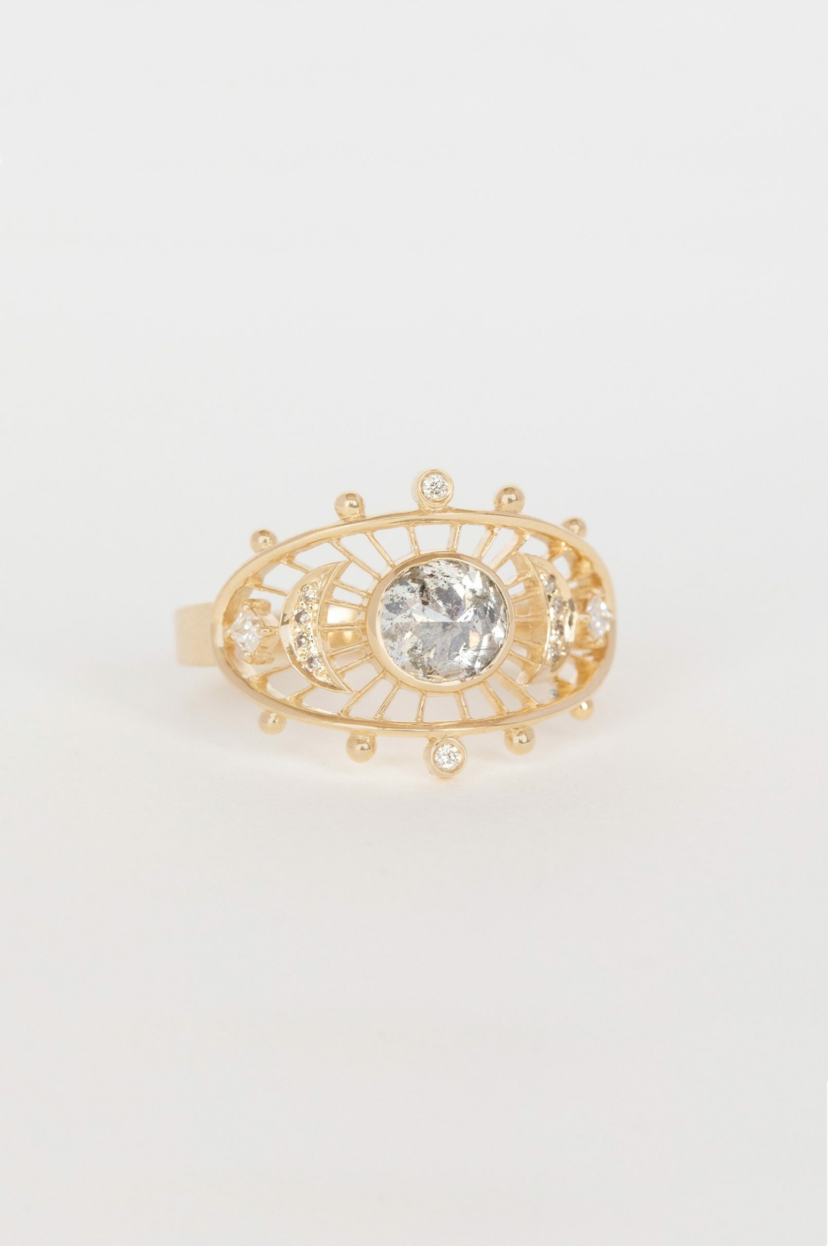 Yellow gold ring round grey diamond open oval eye frame Celine Daoust