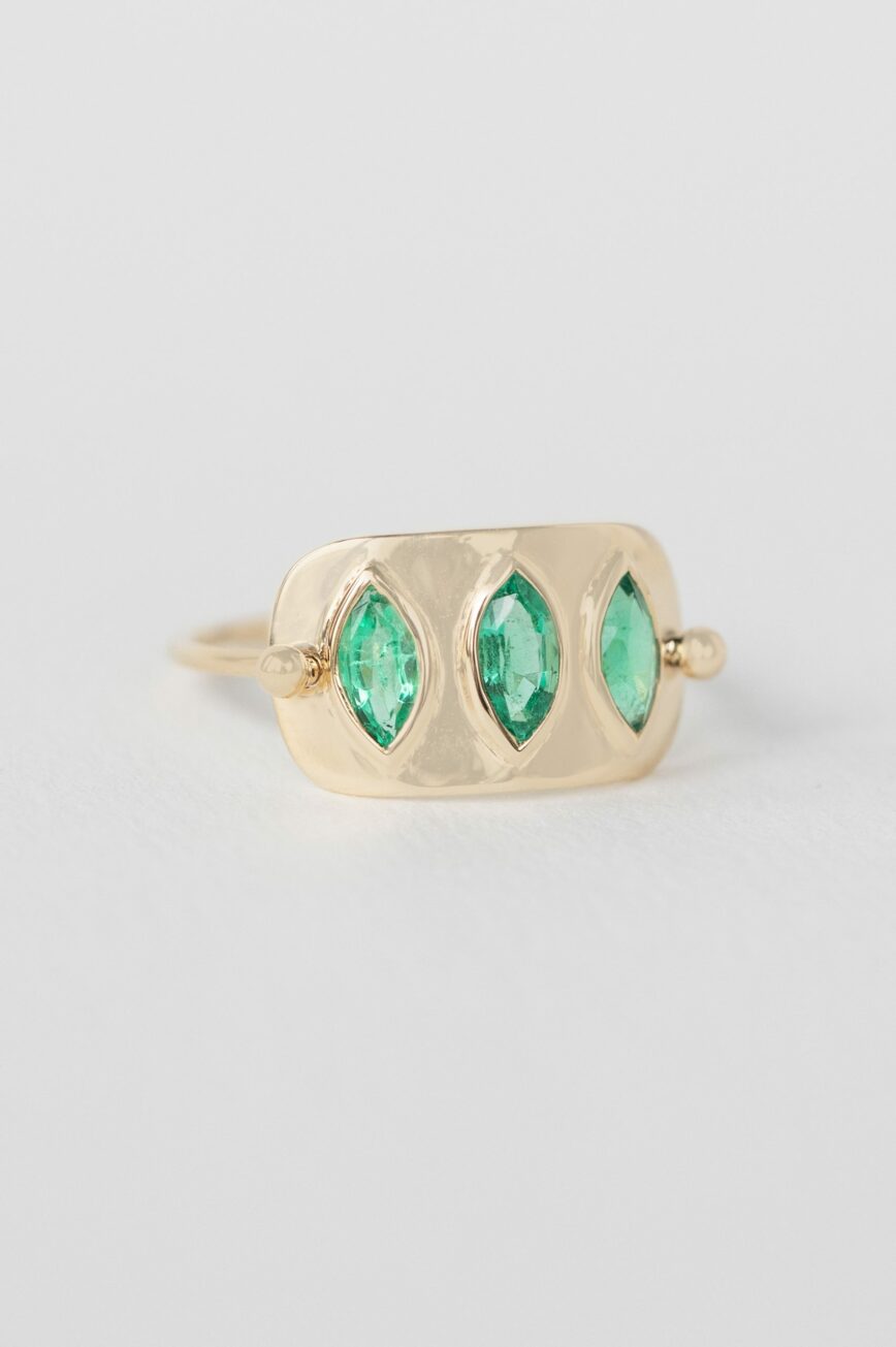Yellow gold wide band ring three marquise emerald bezel set plate Celine Daoust
