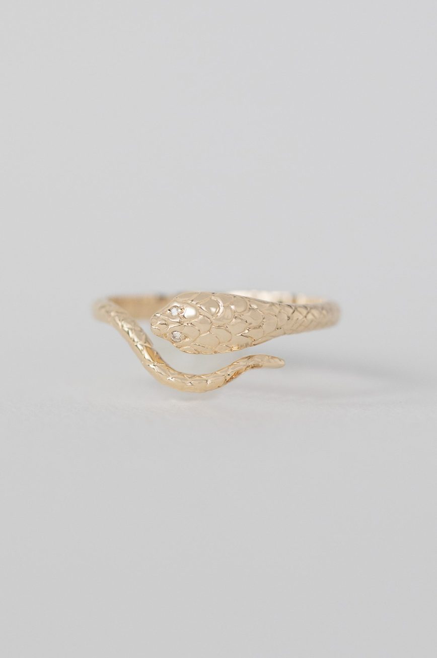 Gold ring sculpted cobra motif engraved band diamond accent Celine Daoust