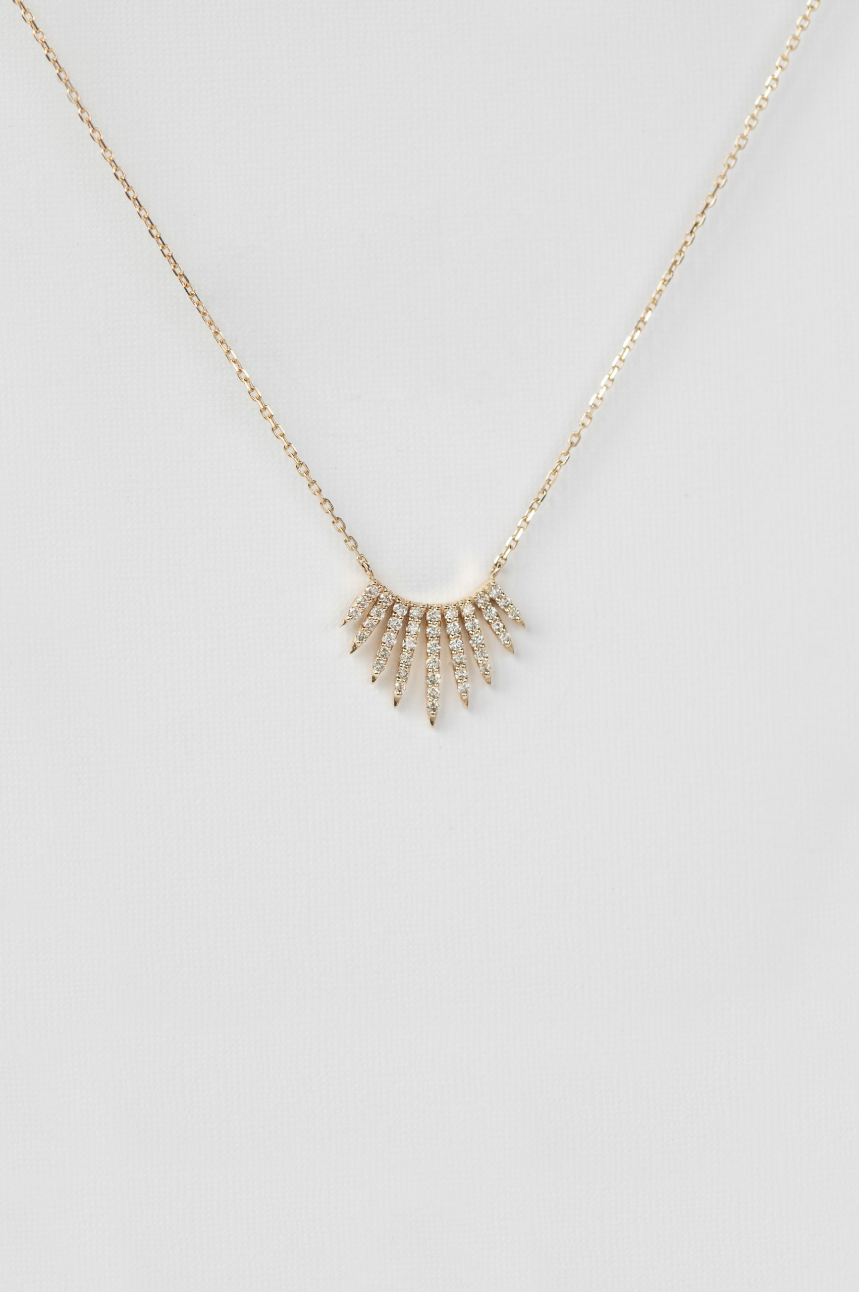 Yellow gold necklace sun ray diamond pavé pendant delicate chain Celine Daoust
