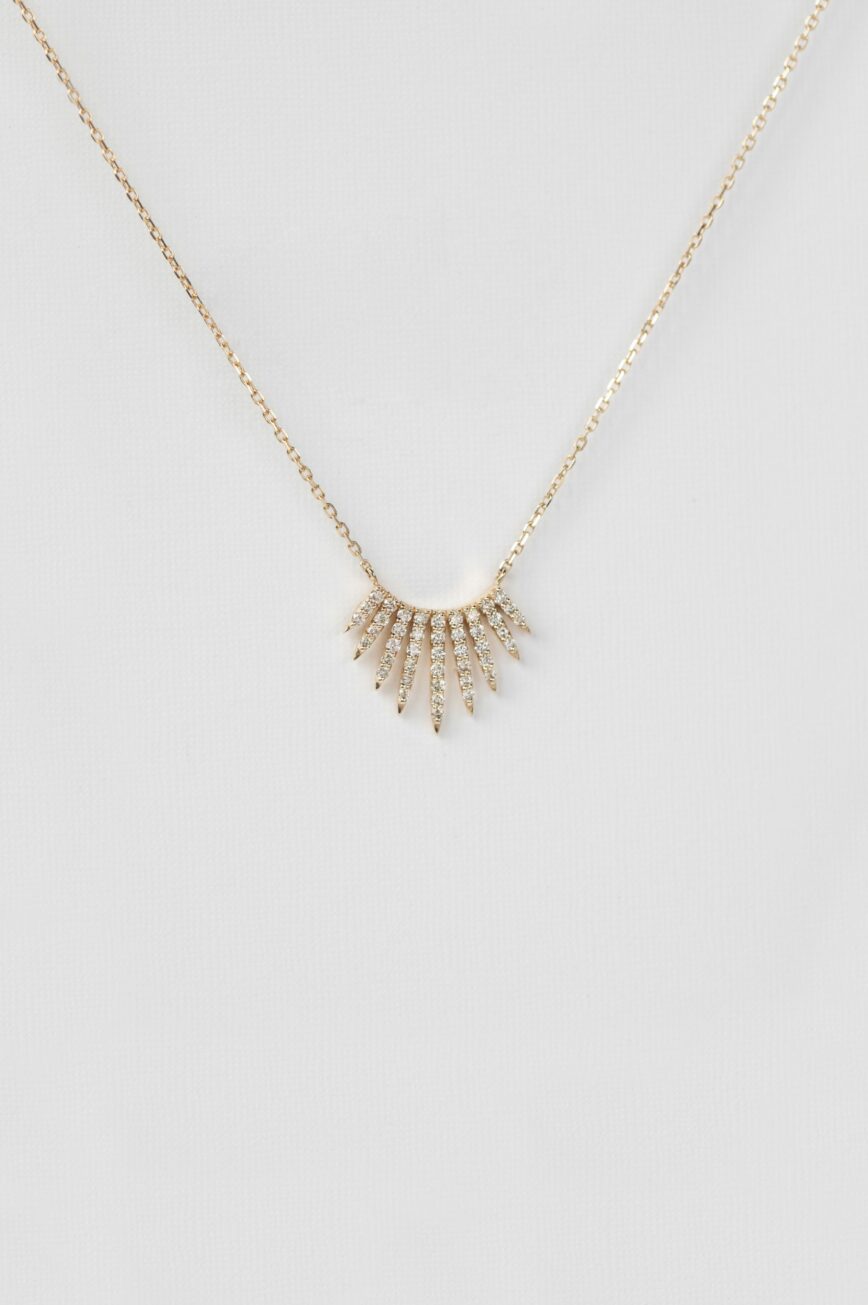 Yellow gold necklace sun ray diamond pavé pendant delicate chain Celine Daoust