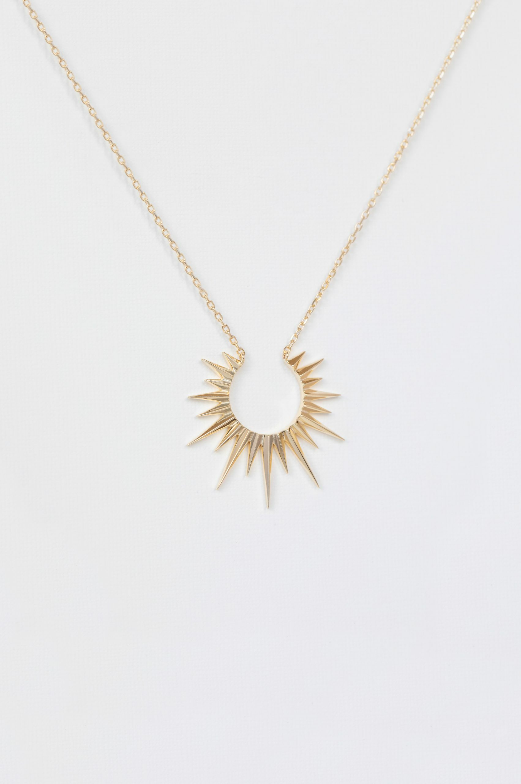 Yellow gold necklace open sun ray pendant delicate chain Celine Daoust