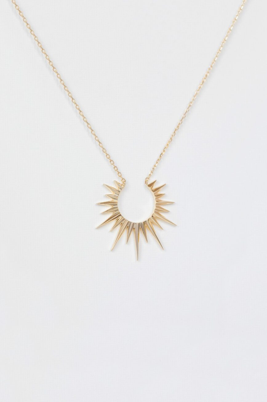 Yellow gold necklace open sun ray pendant delicate chain Celine Daoust