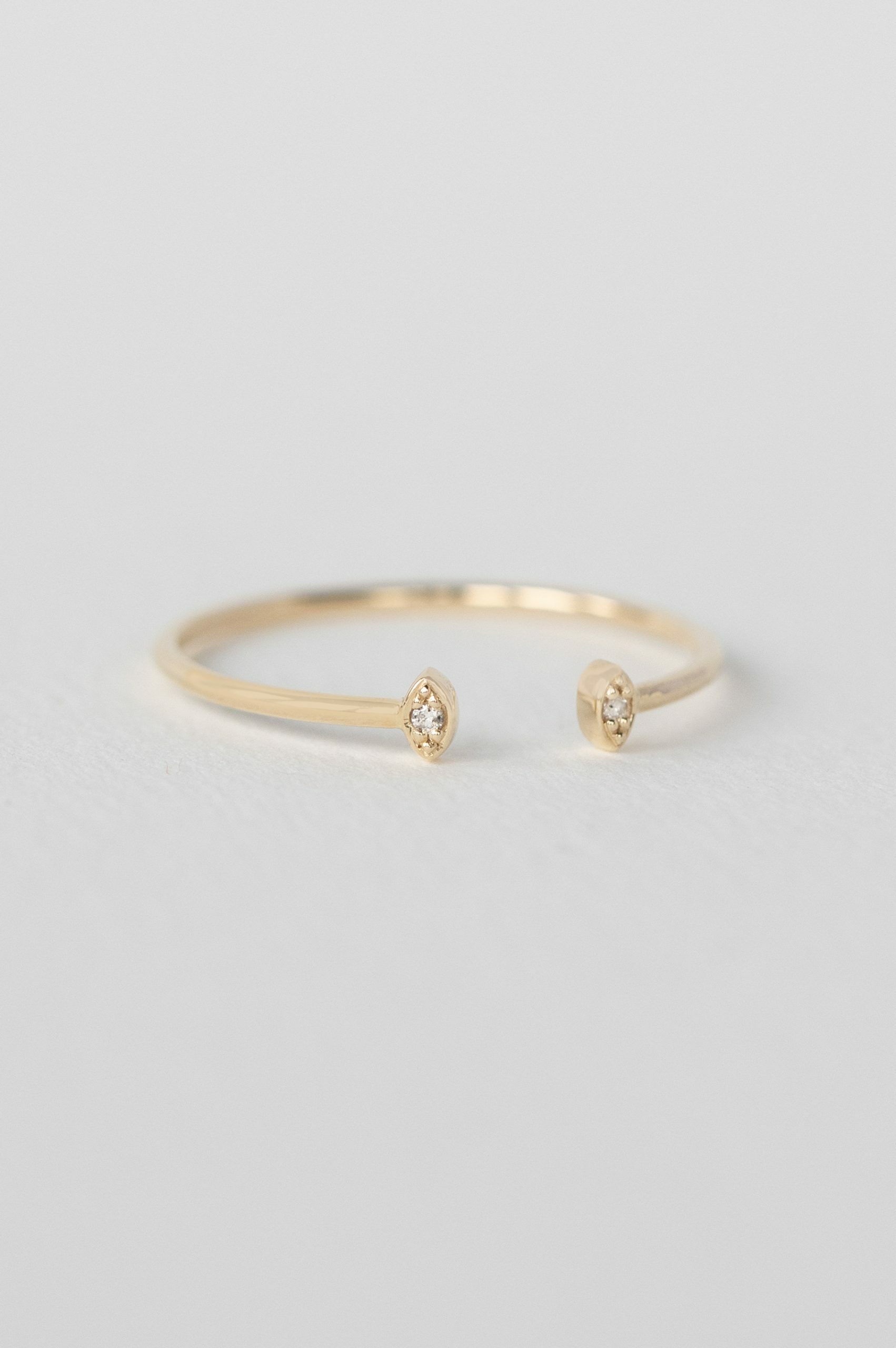 Yellow gold open ring two marquise diamond eye motifs slim band Celine Daoust