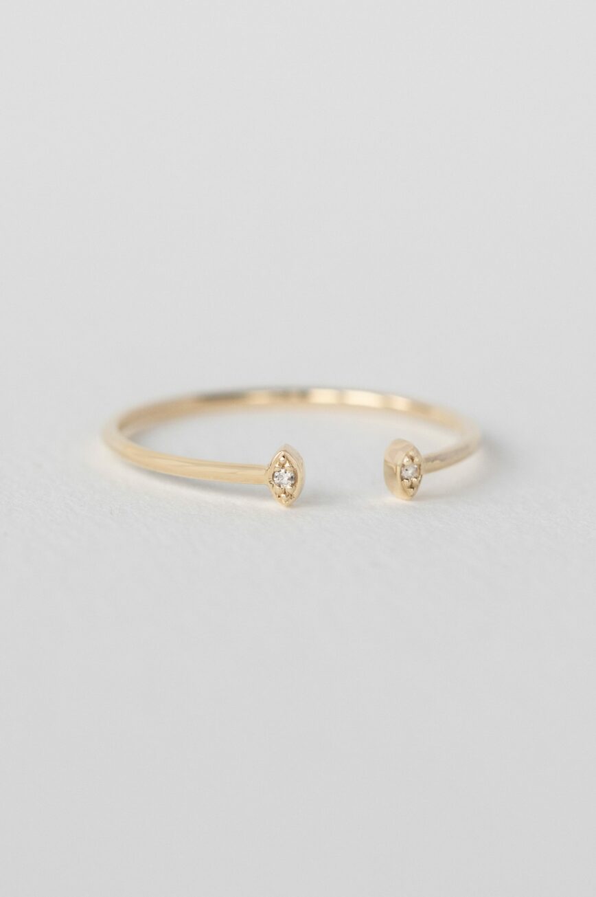 Yellow gold open ring two marquise diamond eye motifs slim band Celine Daoust