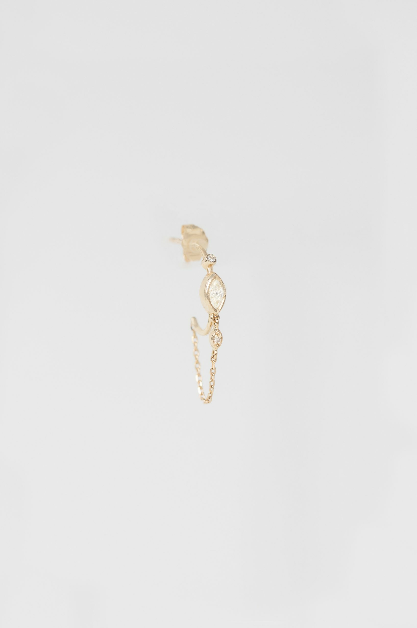 Yellow gold single hoop earring marquise diamond eye motif chain drop Celine Daoust