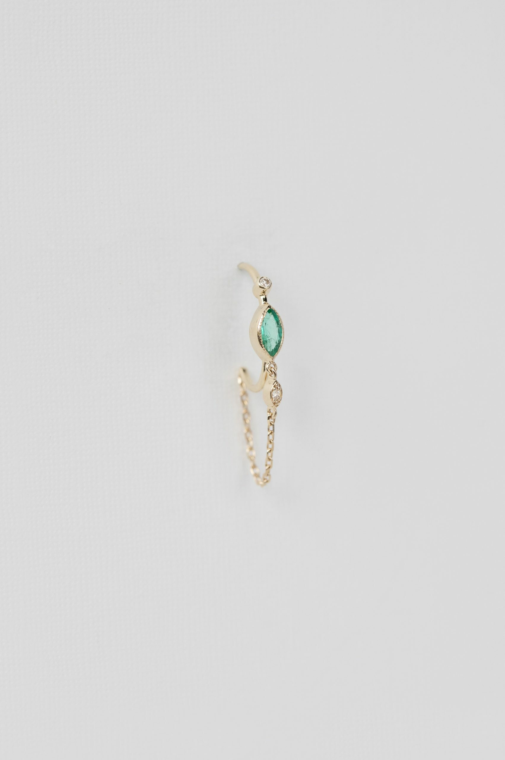 Yellow gold single hoop earring marquise emerald diamond eye motif chain drop Celine Daoust