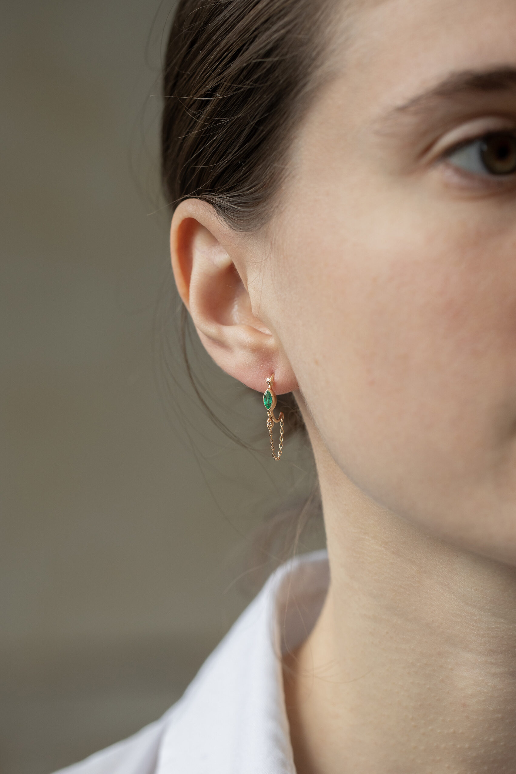 Yellow gold single hoop earring marquise emerald diamond eye motif chain drop Celine Daoust