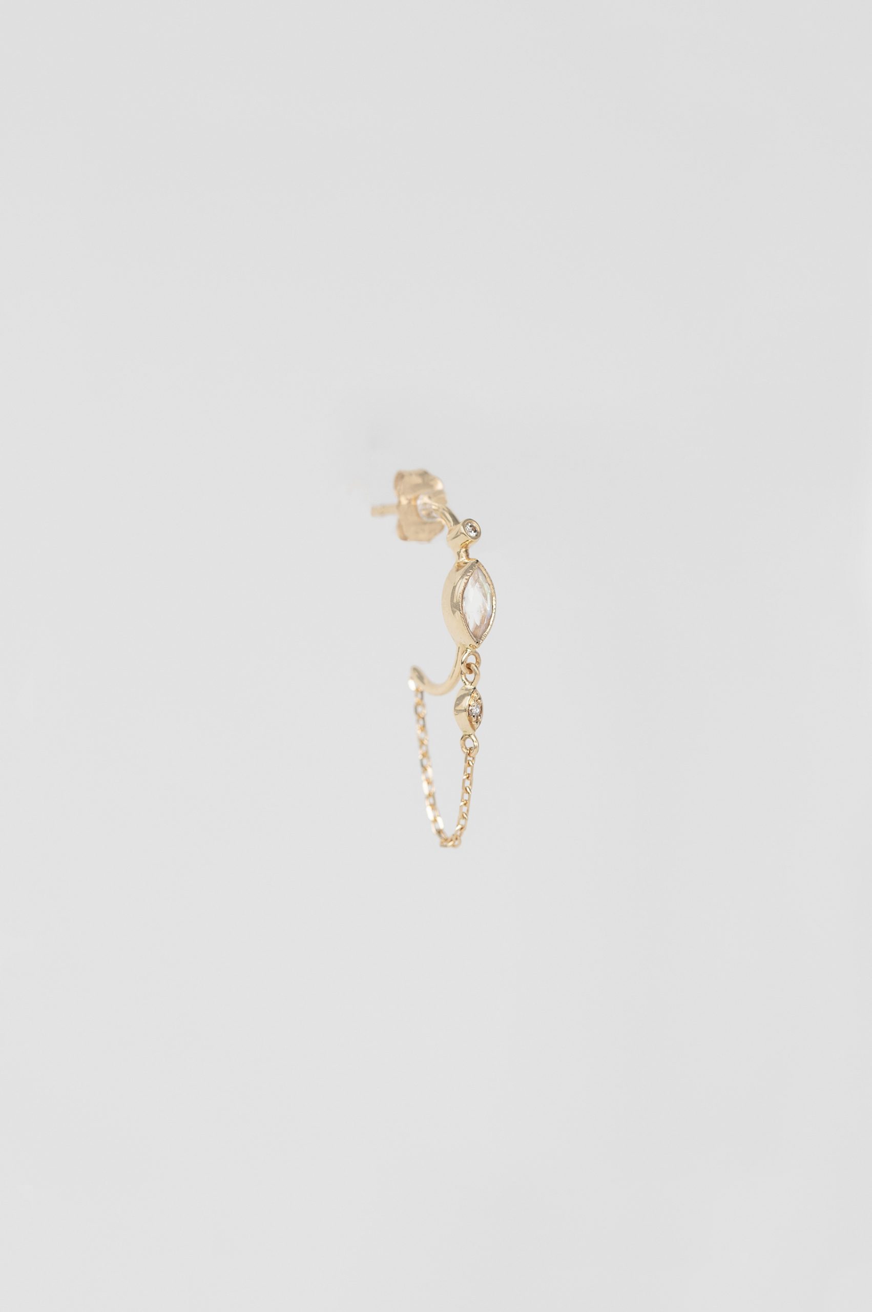 Gold hoop earring marquise moonstone eye motif diamond Céline Daoust