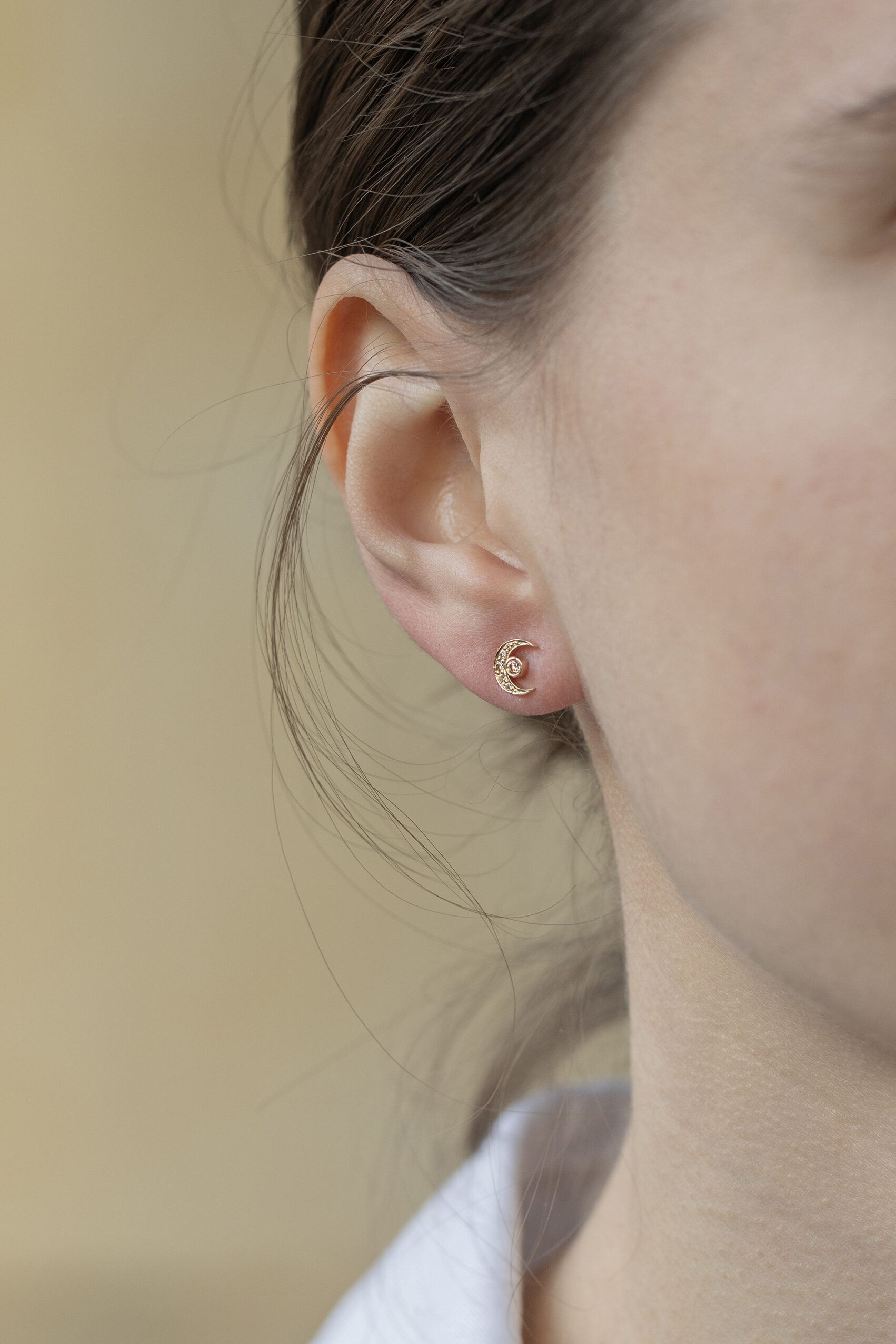 Yellow gold stud earrings crescent moon motif diamond accents pair Celine Daoust