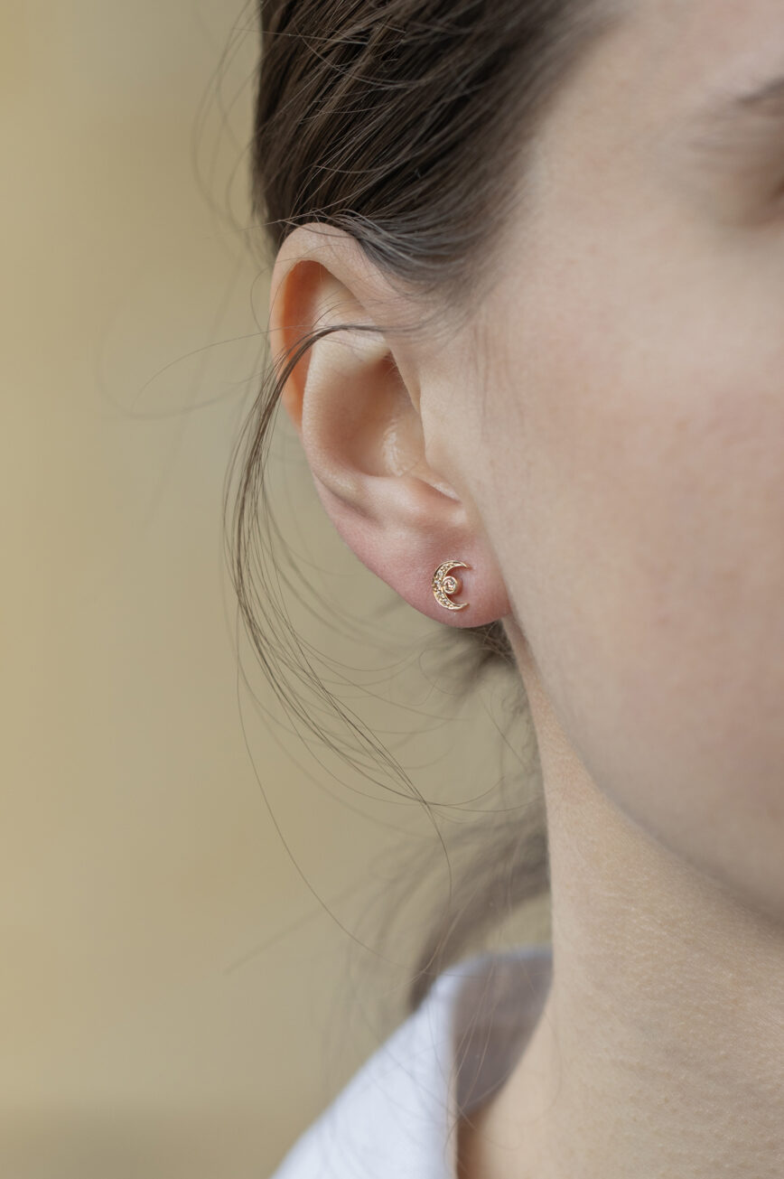 Yellow gold stud earrings crescent moon motif diamond accents pair Celine Daoust