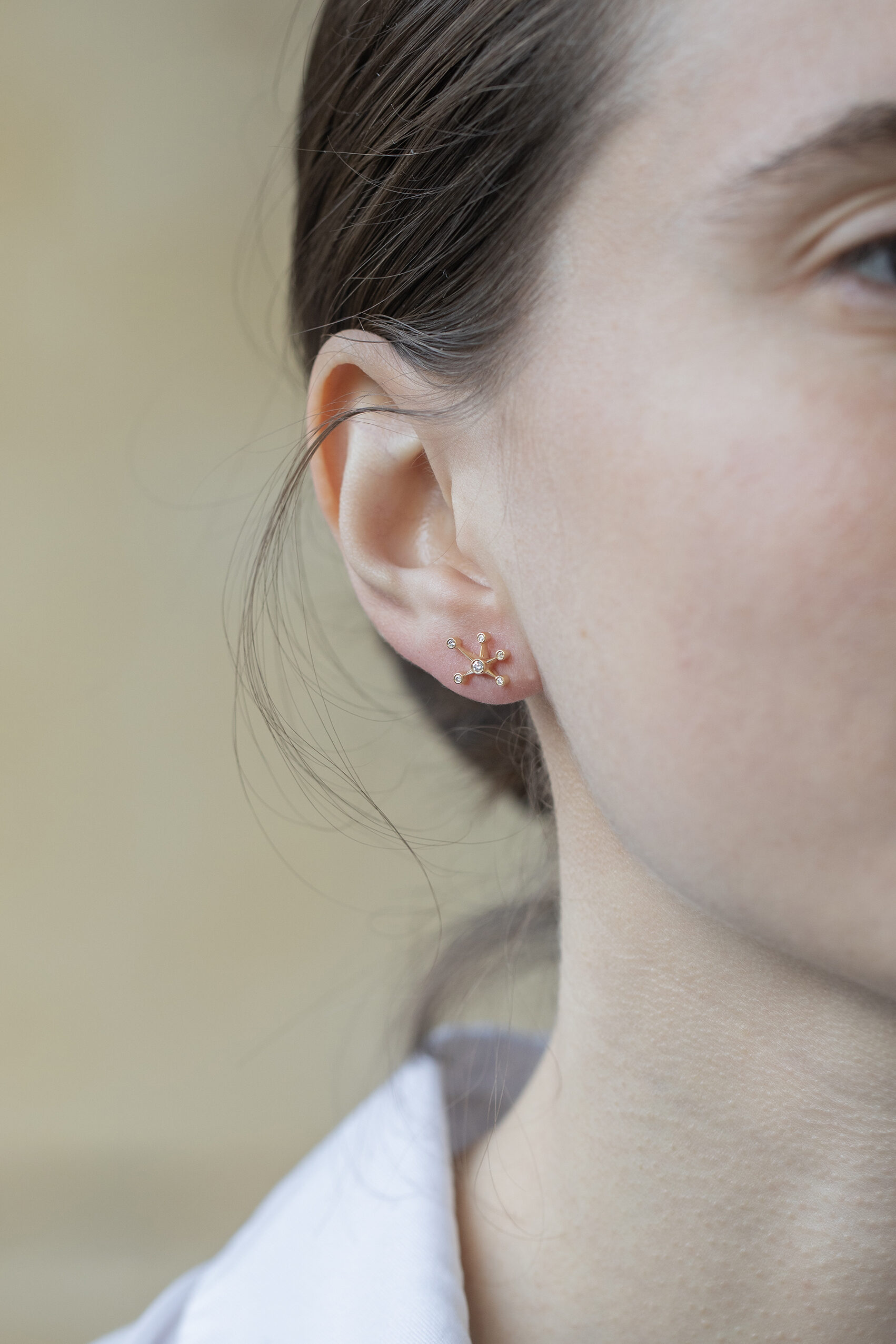 Yellow gold stud earrings starburst diamond constellation motif pair Celine Daoust